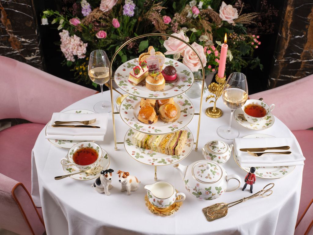 Image may contain Brunch Food Furniture Table Tabletop Cutlery Fork Plate Chair Cup Candle Bread and Person