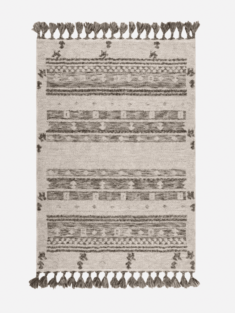 Image may contain: Home Decor, Rug, Architecture, and Building