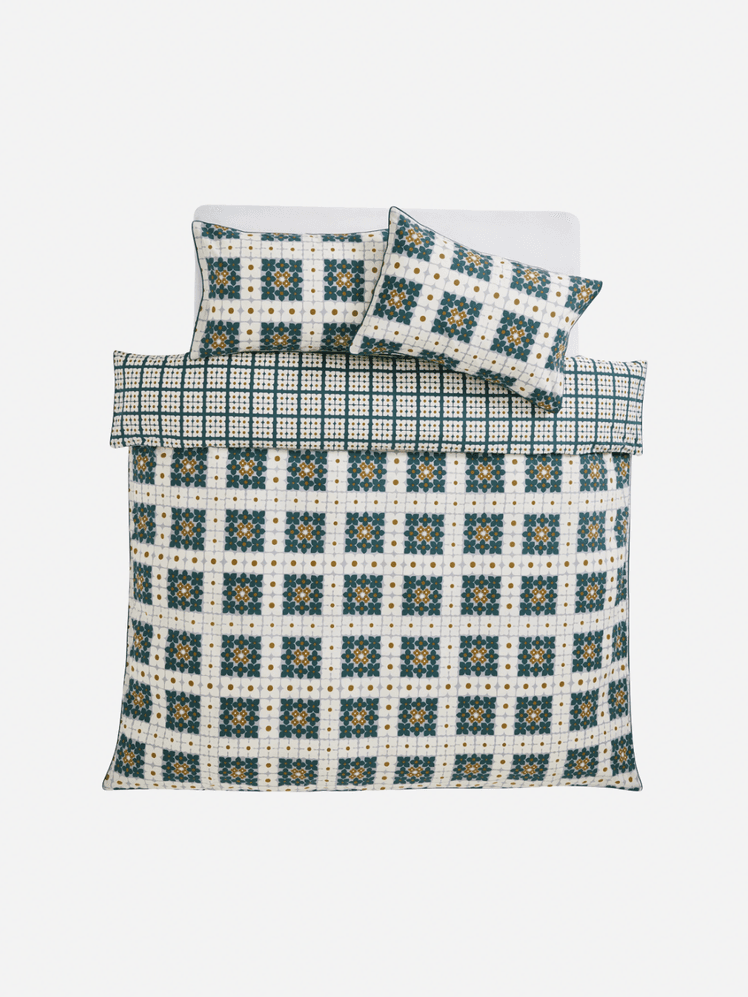 Image may contain: Cushion, Home Decor, Pillow, Couch, Furniture, Blouse, and Clothing