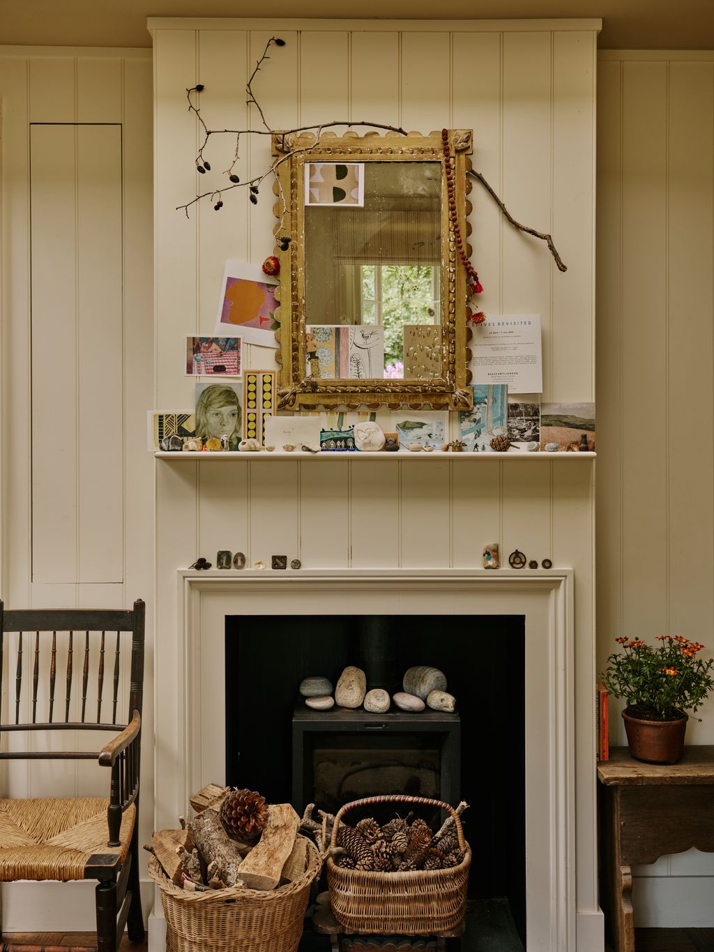 Image may contain Indoors Interior Design Fireplace Chair Furniture Person Basket Desk Table and Architecture