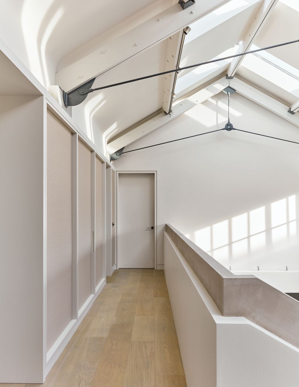 Image may contain Architecture Building House Housing Indoors Loft Room Interior Design Floor and Flooring