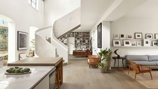 Image may contain Architecture Building Furniture Indoors Living Room Room Dining Room Dining Table Table and House