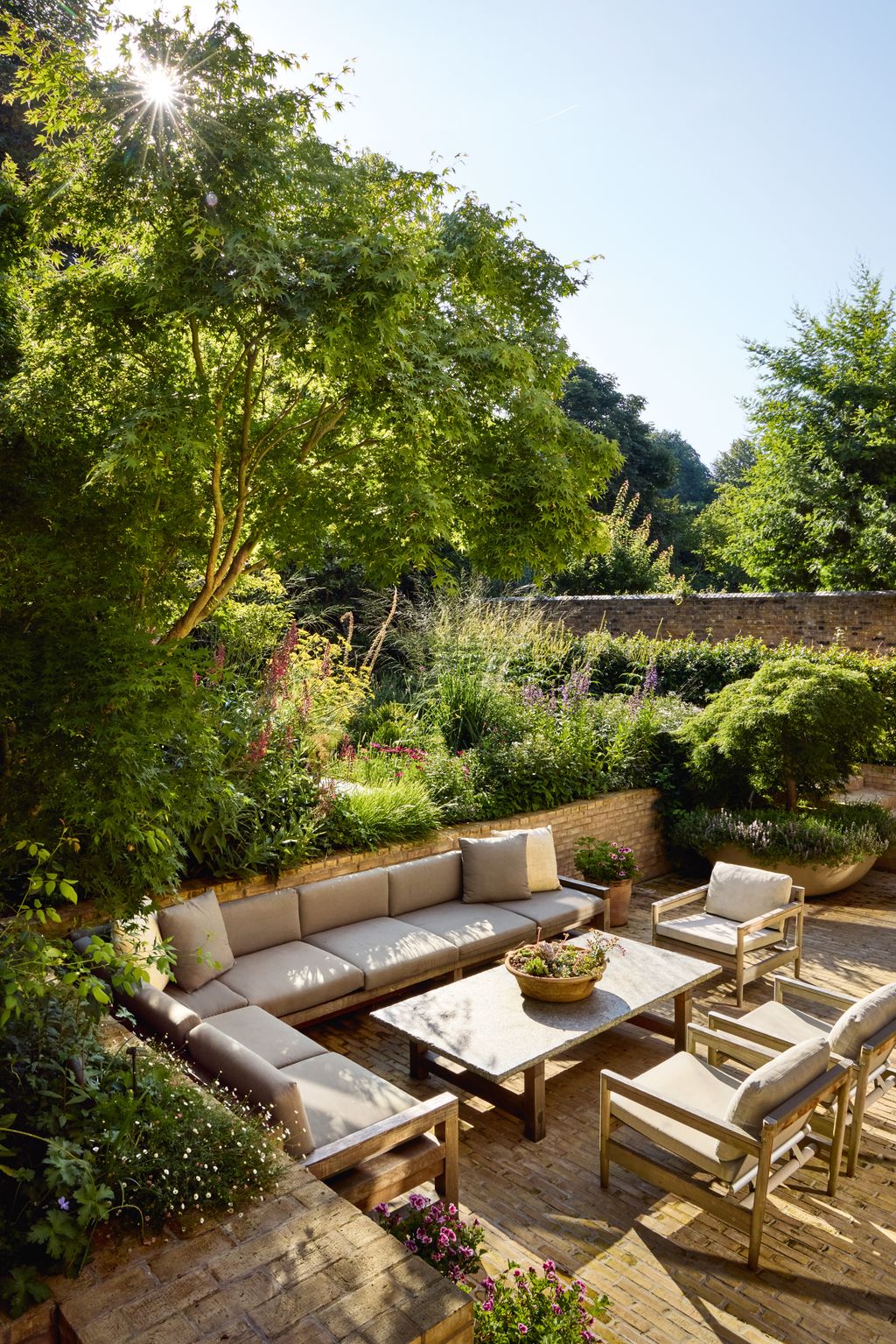 Image may contain Backyard Nature Outdoors Yard Furniture Table Chair Garden Couch Architecture and Building