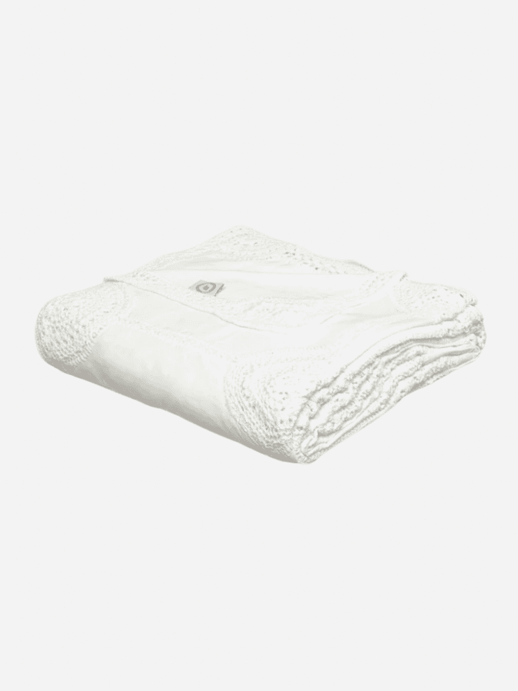 Image may contain: Blanket, Cushion, Home Decor, and Diaper