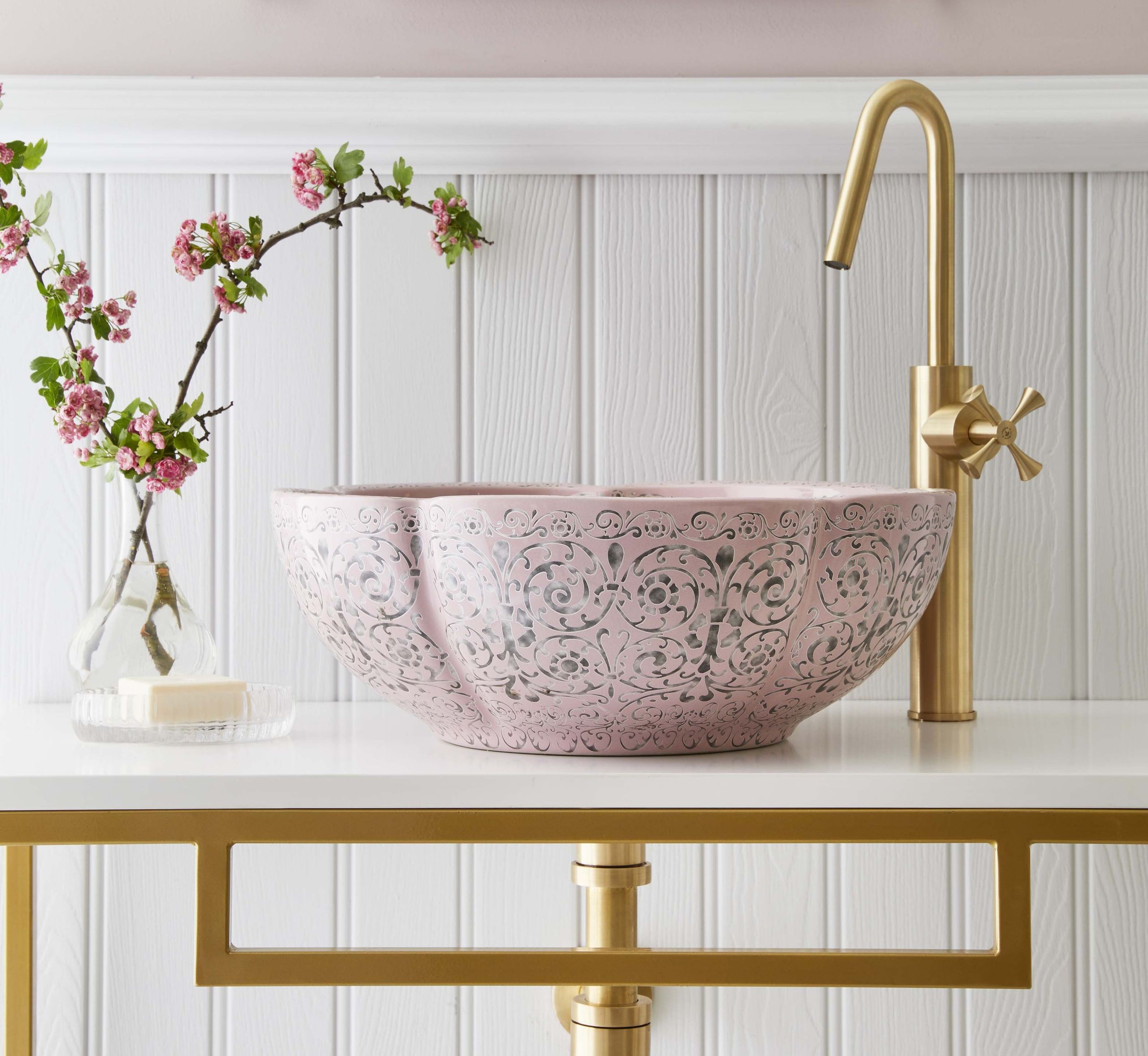 Image may contain: Sink, Sink Faucet, Basin, Flower, and Plant