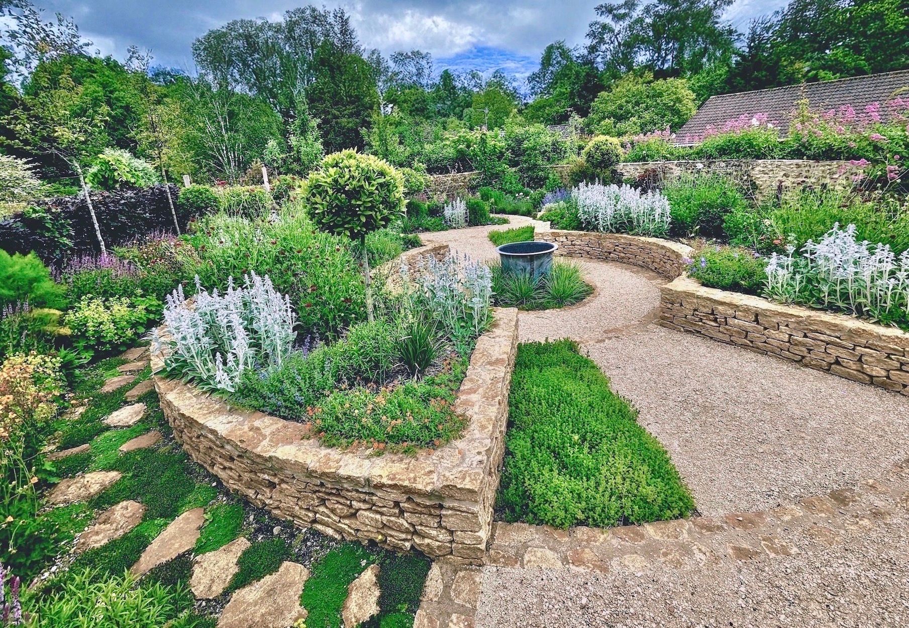 Image may contain: Garden, Nature, Outdoors, Grass, Park, Plant, Backyard, Yard, Path, Vegetation, Herbal, Herbs, and Walkway