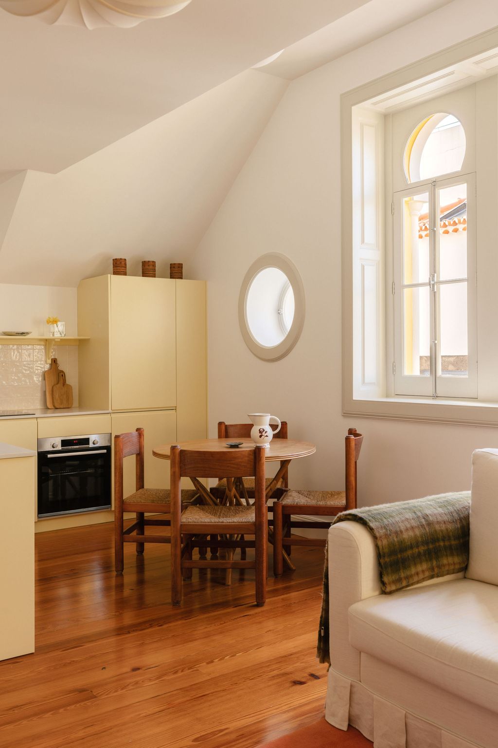 Image may contain Indoors Interior Design Wood Chair Furniture Architecture Building Living Room Room and Hardwood