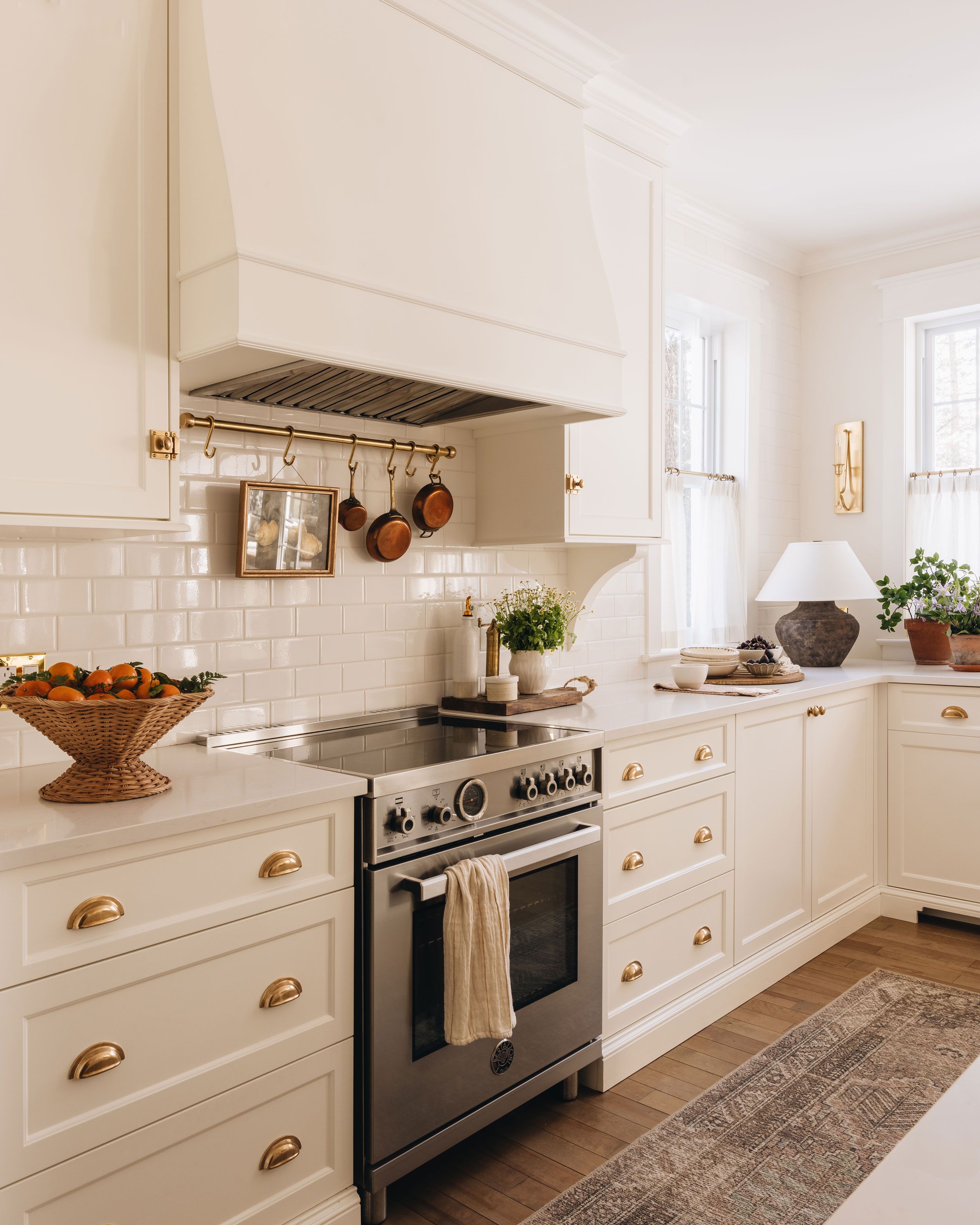 Image may contain: Indoors, Interior Design, Kitchen, Sink, Sink Faucet, Art, and Painting