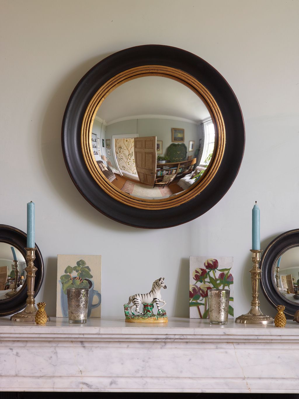 Image may contain Photography Plant Art Painting Fisheye Person Candle Indoors Interior Design and Pottery