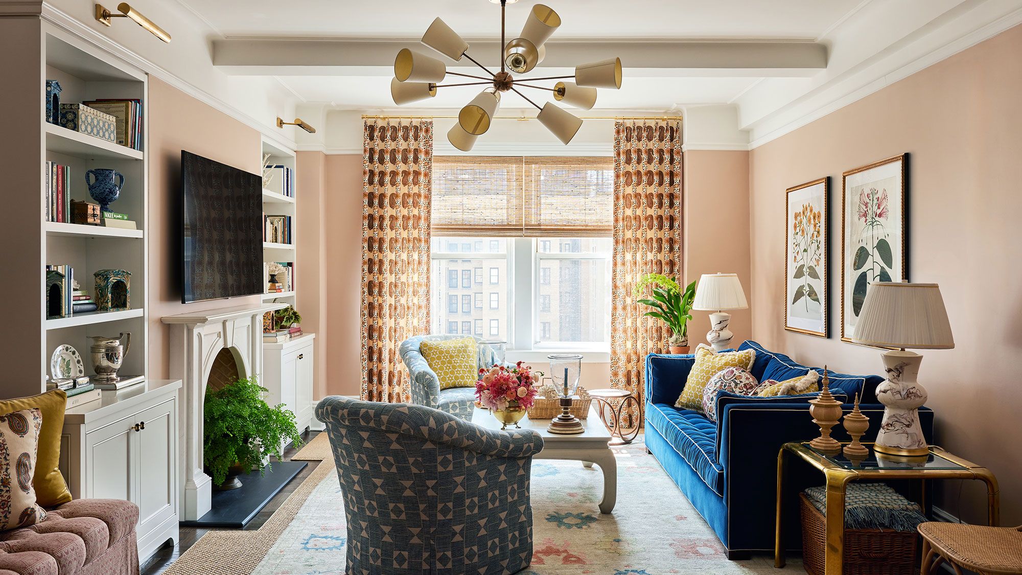 Image may contain: Home Decor, Plant, Lamp, Couch, Furniture, Rug, Table, Architecture, Building, Indoors, and Living Room