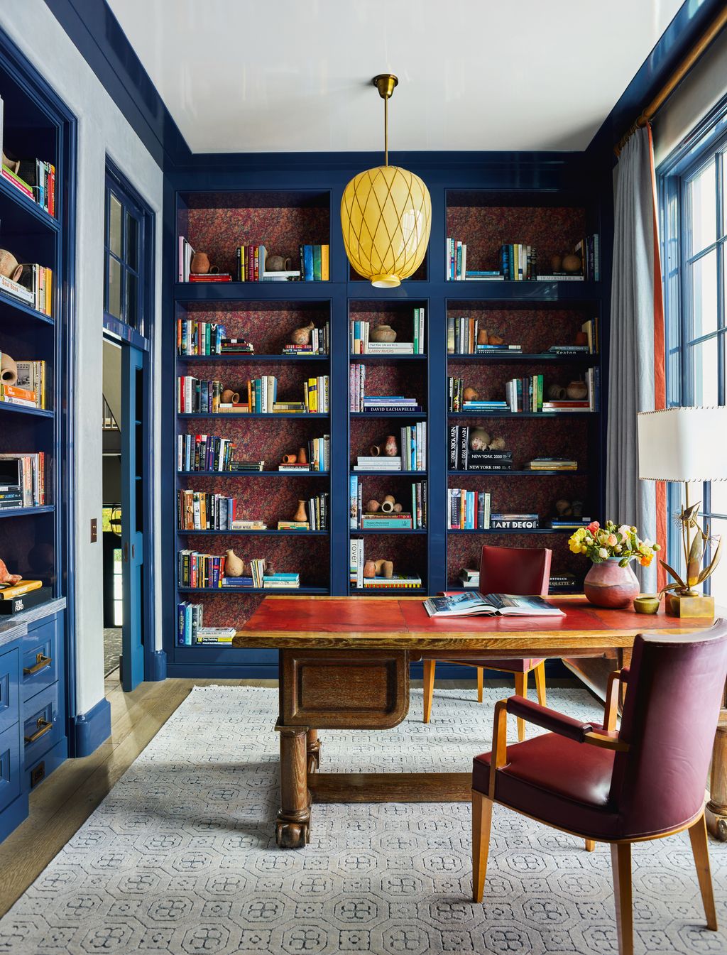 Image may contain Book Publication Lamp Shelf Chair Furniture Desk Table Indoors Interior Design and Home Decor