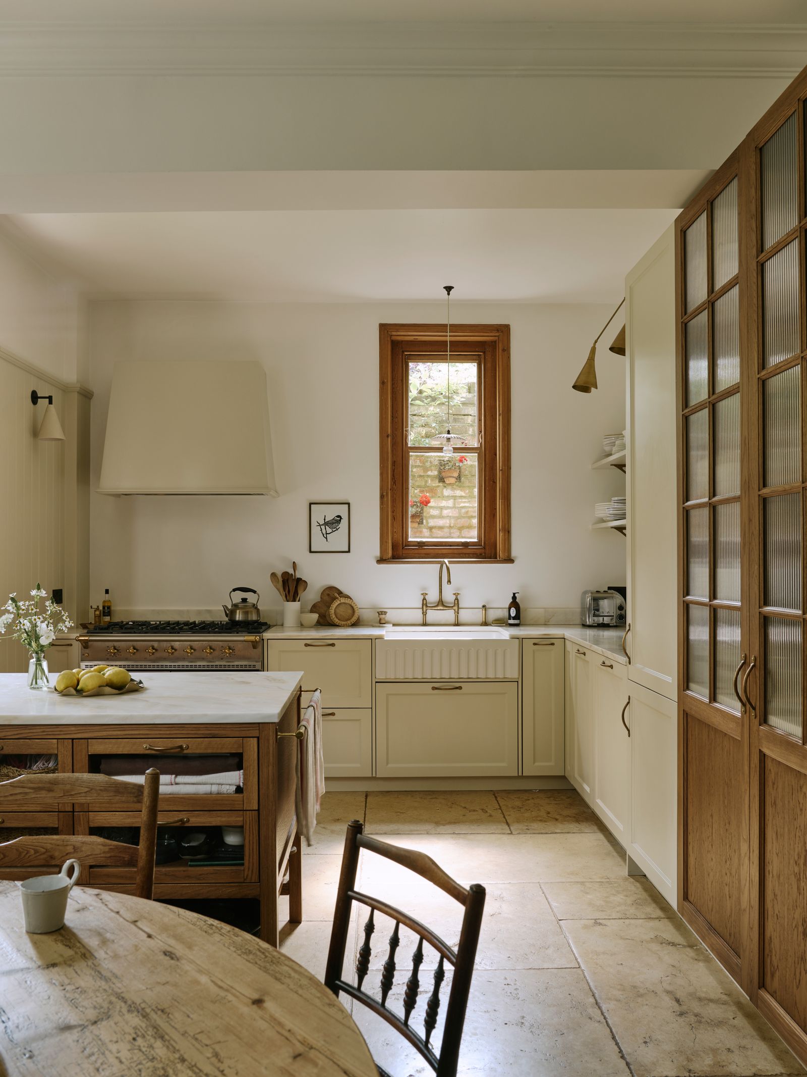 Image may contain Indoors Interior Design Chair Furniture Kitchen Architecture Building Dining Room and Dining Table