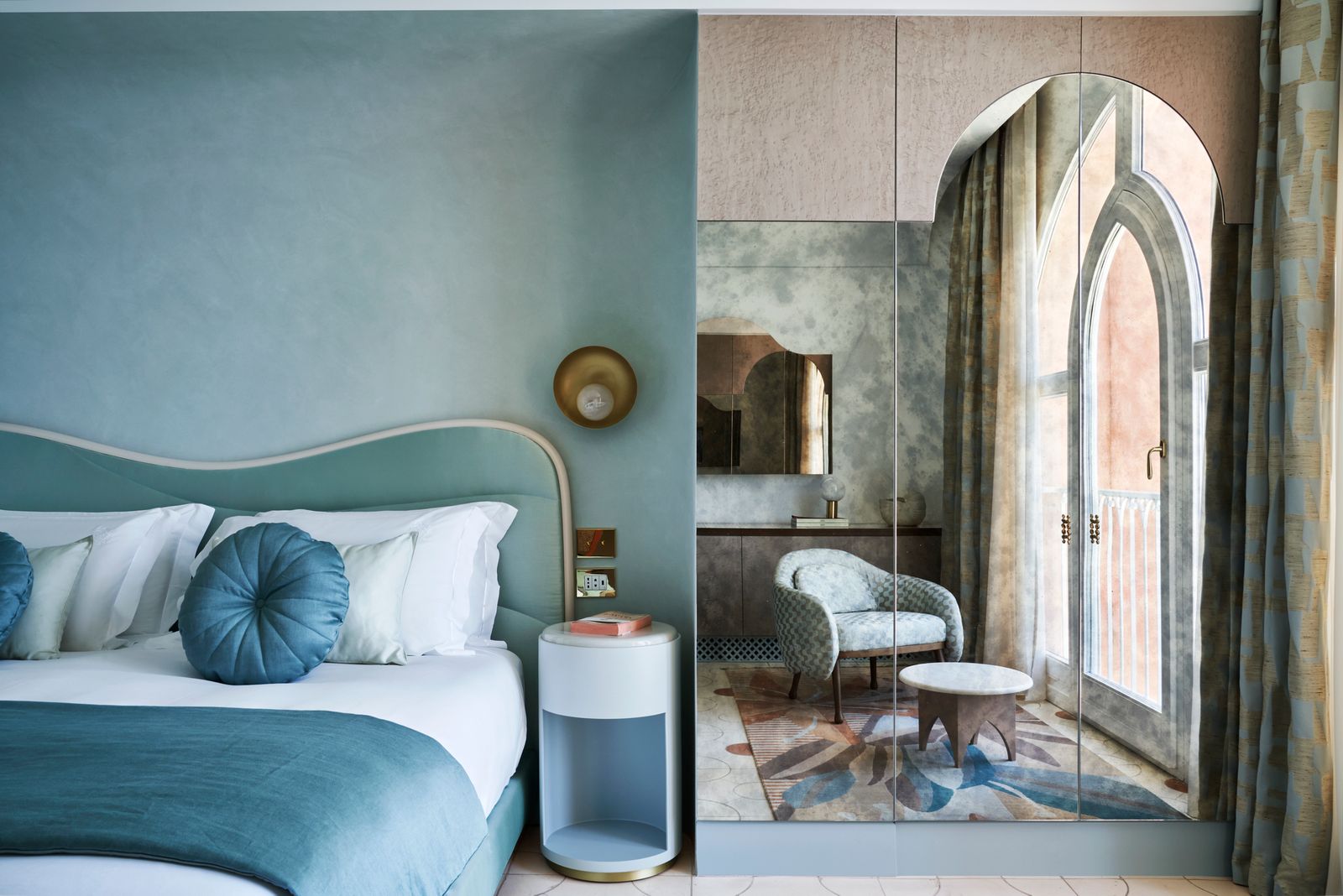 Image may contain Cushion Home Decor Indoors Interior Design Bed Furniture Chair Rug Pillow Bedroom and Room