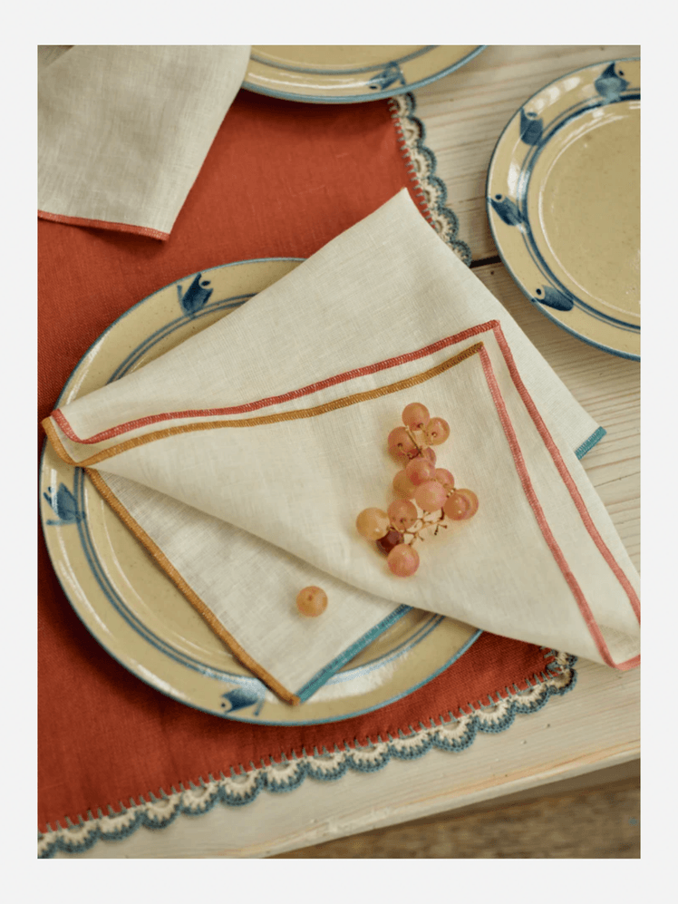 Image may contain: Napkin, Plate, Home Decor, and Linen
