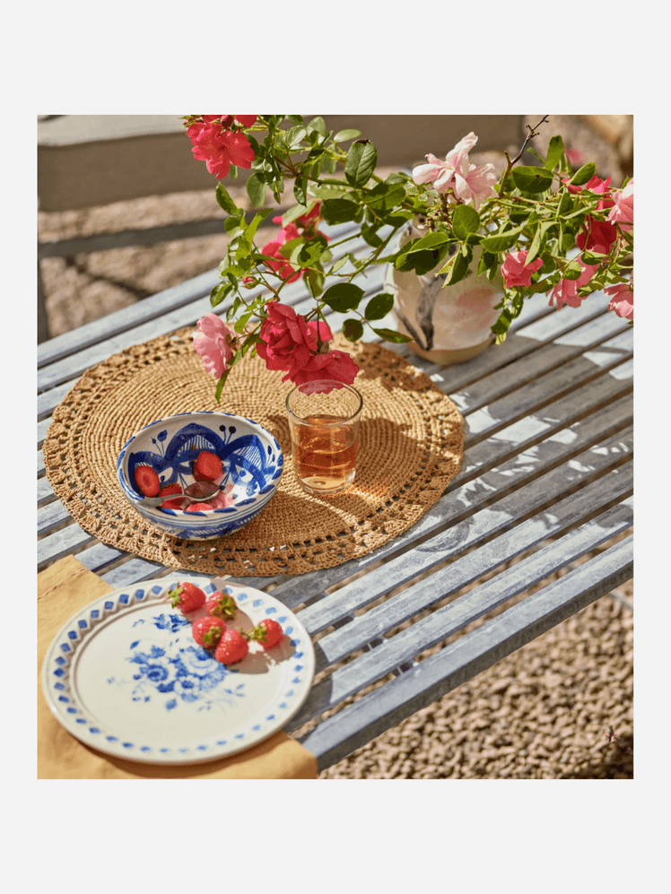 Image may contain: Flower, Flower Arrangement, Plant, Geranium, Saucer, Plate, Pottery, Flower Bouquet, Furniture, and Table