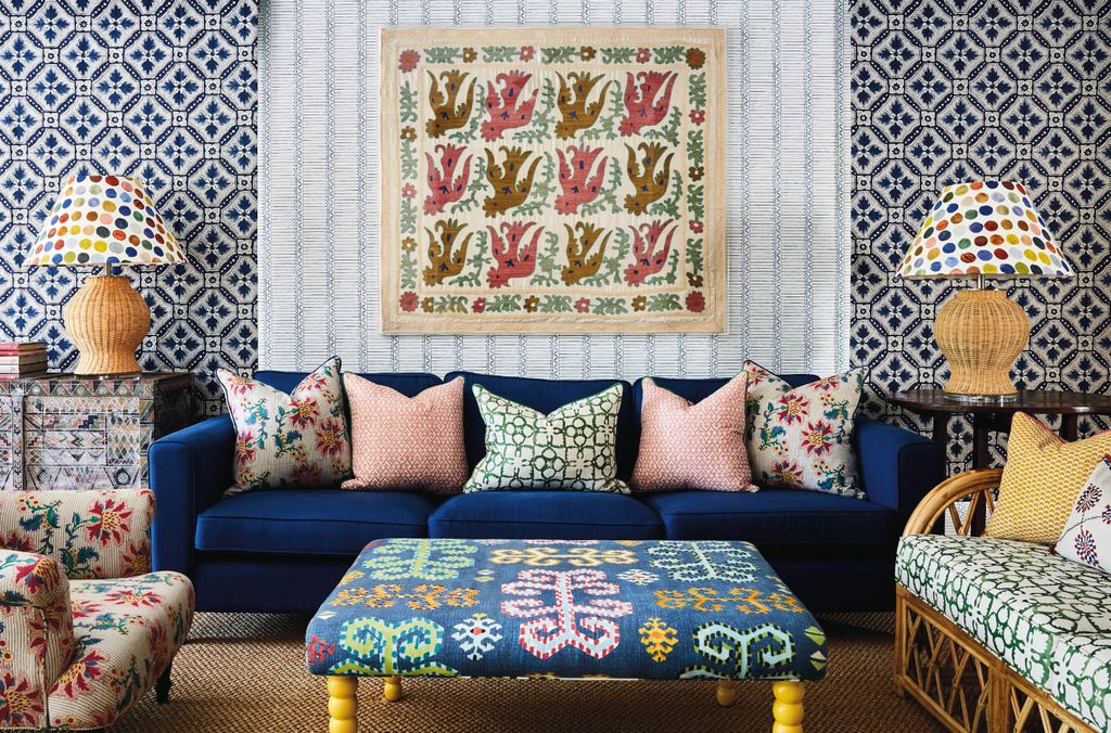 Image may contain Lamp Home Decor Cushion Couch Furniture Pillow and Chair