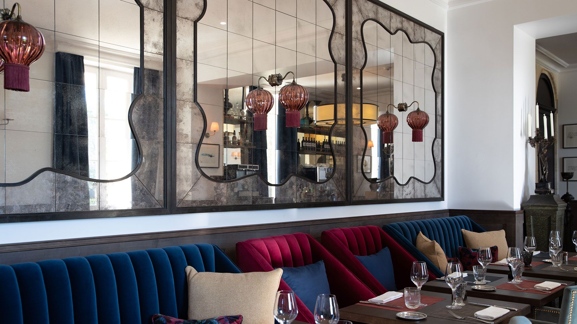 Image may contain: Indoors, Restaurant, Architecture, Building, Dining Room, Dining Table, Furniture, Room, and Table