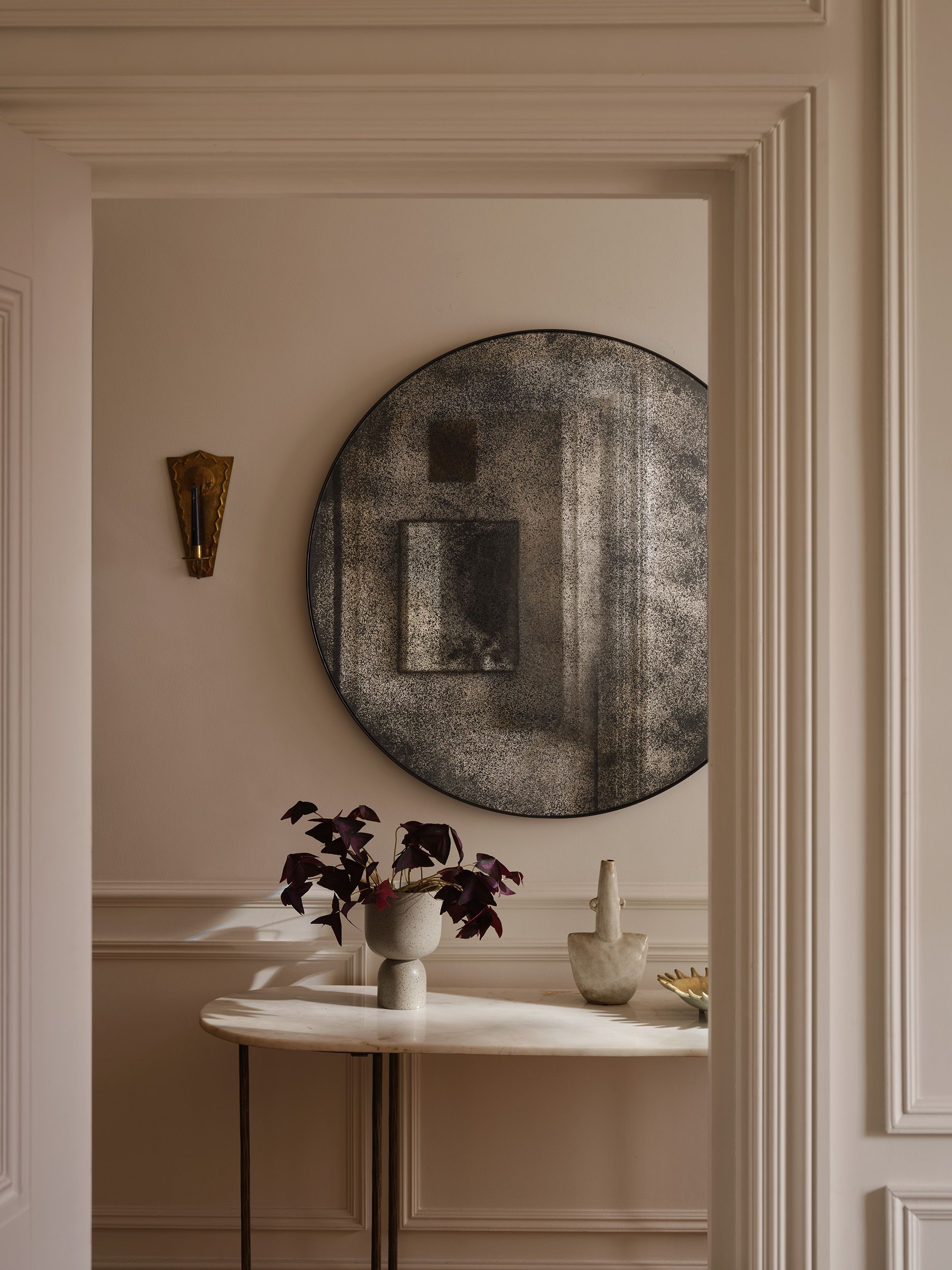 Image may contain: Indoors, Interior Design, Plant, Pottery, Furniture, and Table