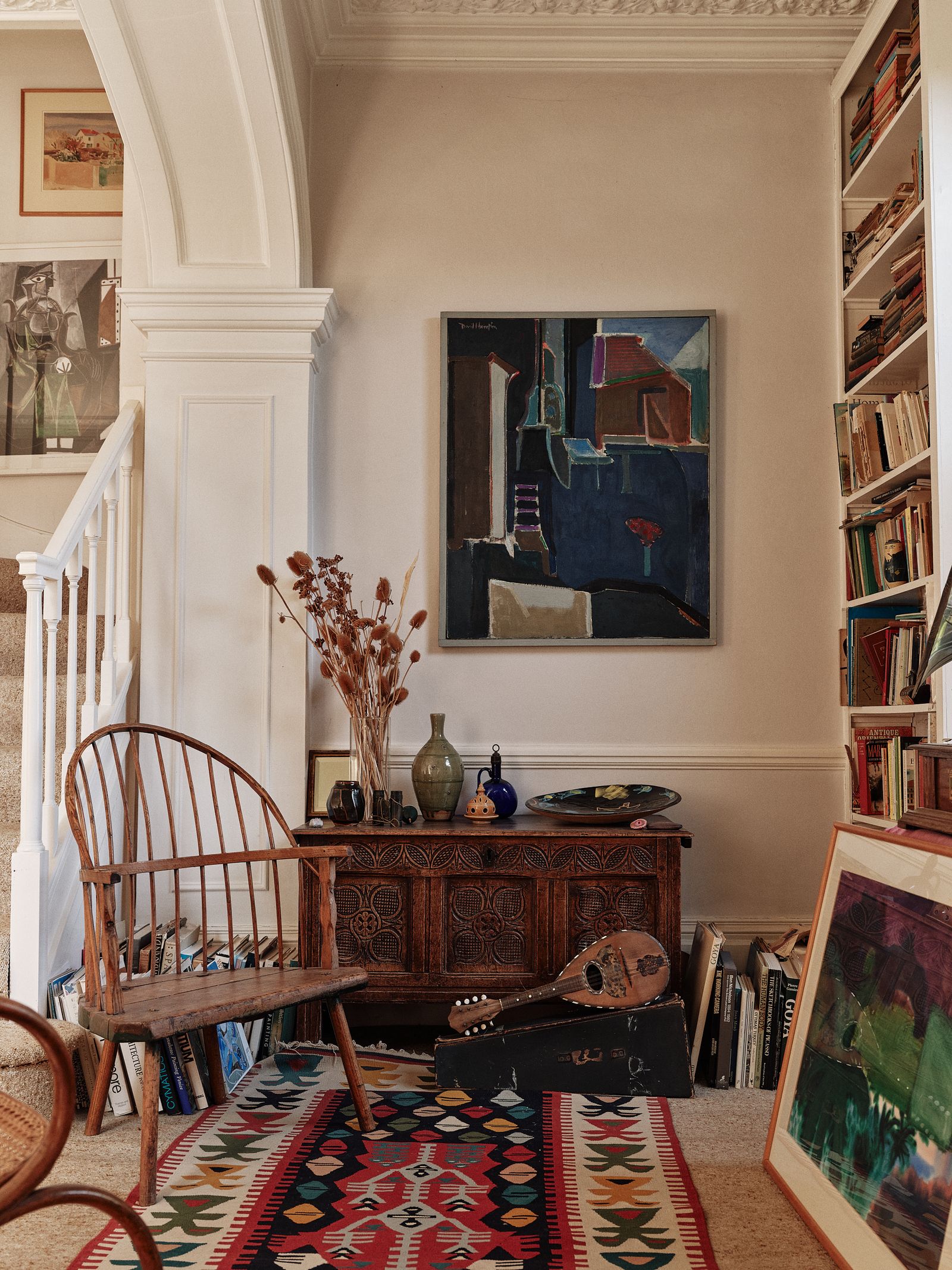 Image may contain Chair Furniture Art Painting Architecture Building Indoors Living Room Room and Interior Design