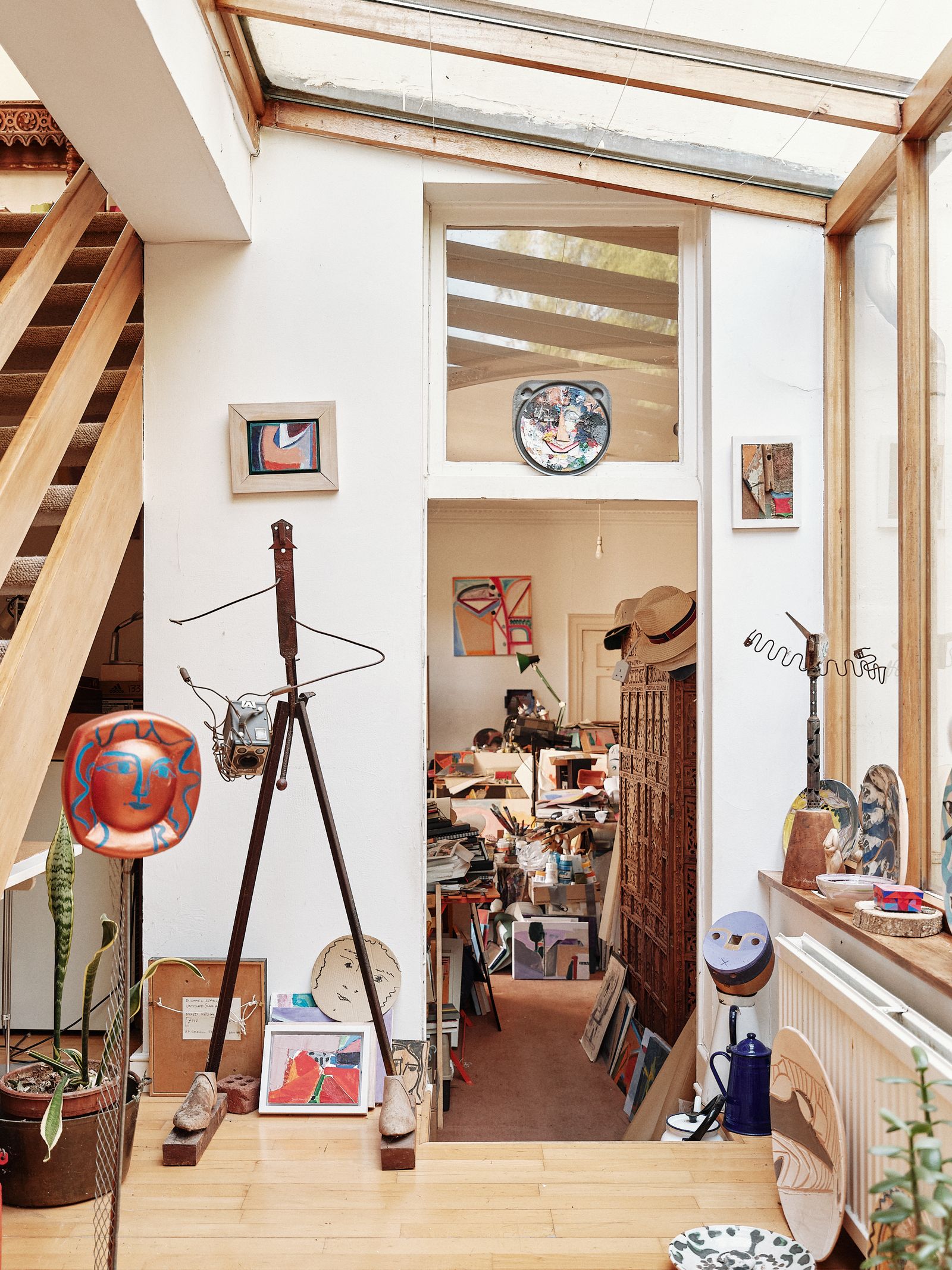 Image may contain Indoors Interior Design Architecture Building House Housing Staircase Art Painting and Clothing