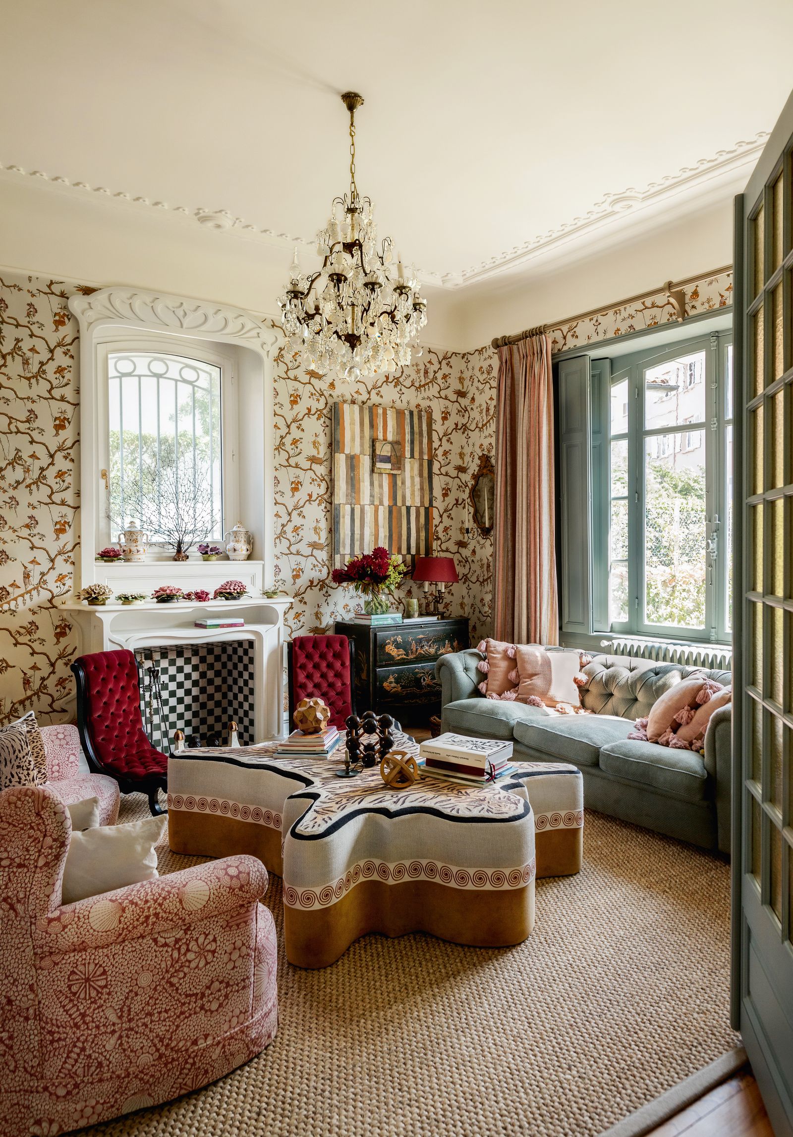 Image may contain Home Decor Lamp Couch Furniture and Chair