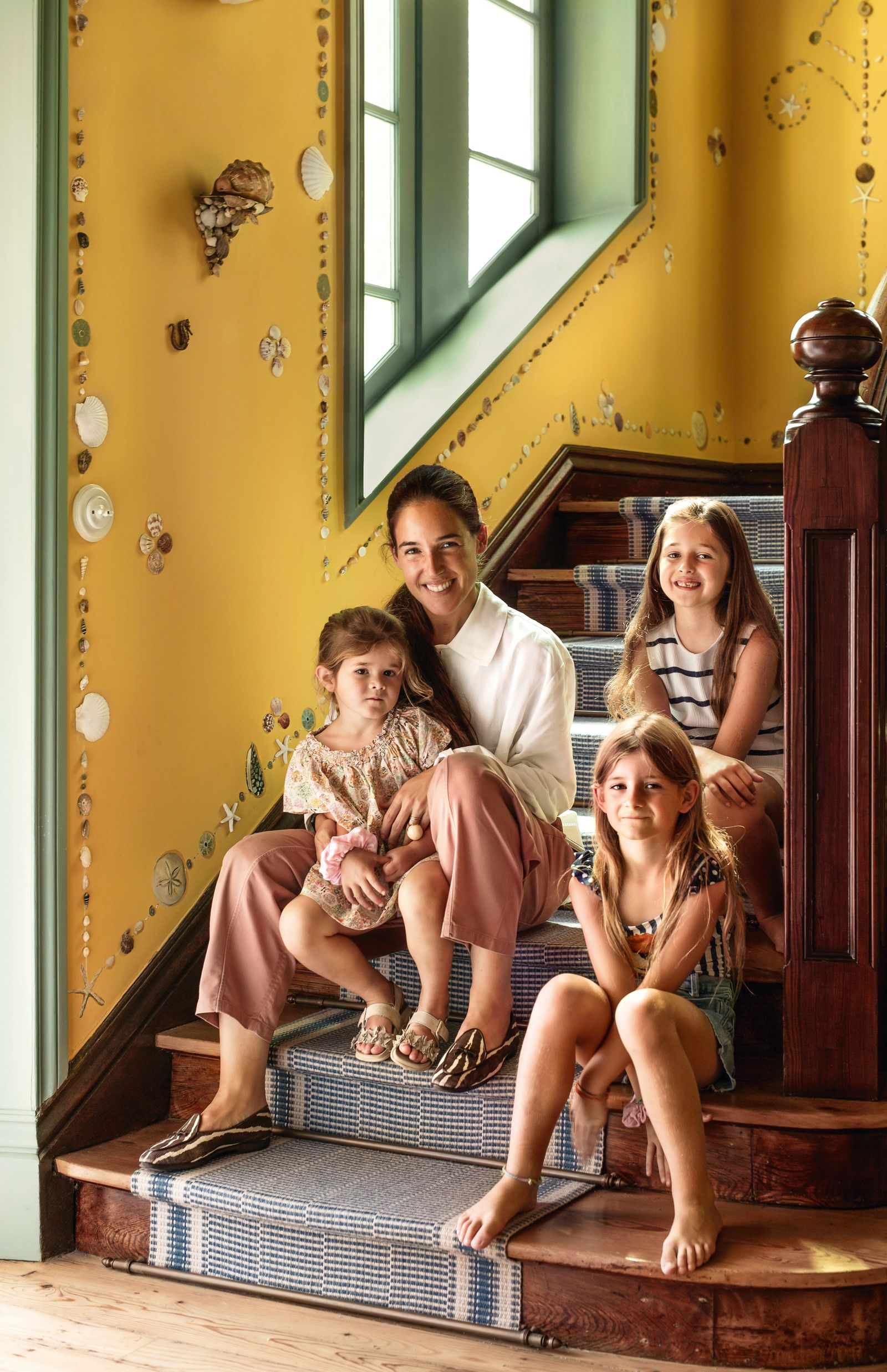 Image may contain People Person Architecture Building House Housing Staircase Child Adult Clothing and Footwear