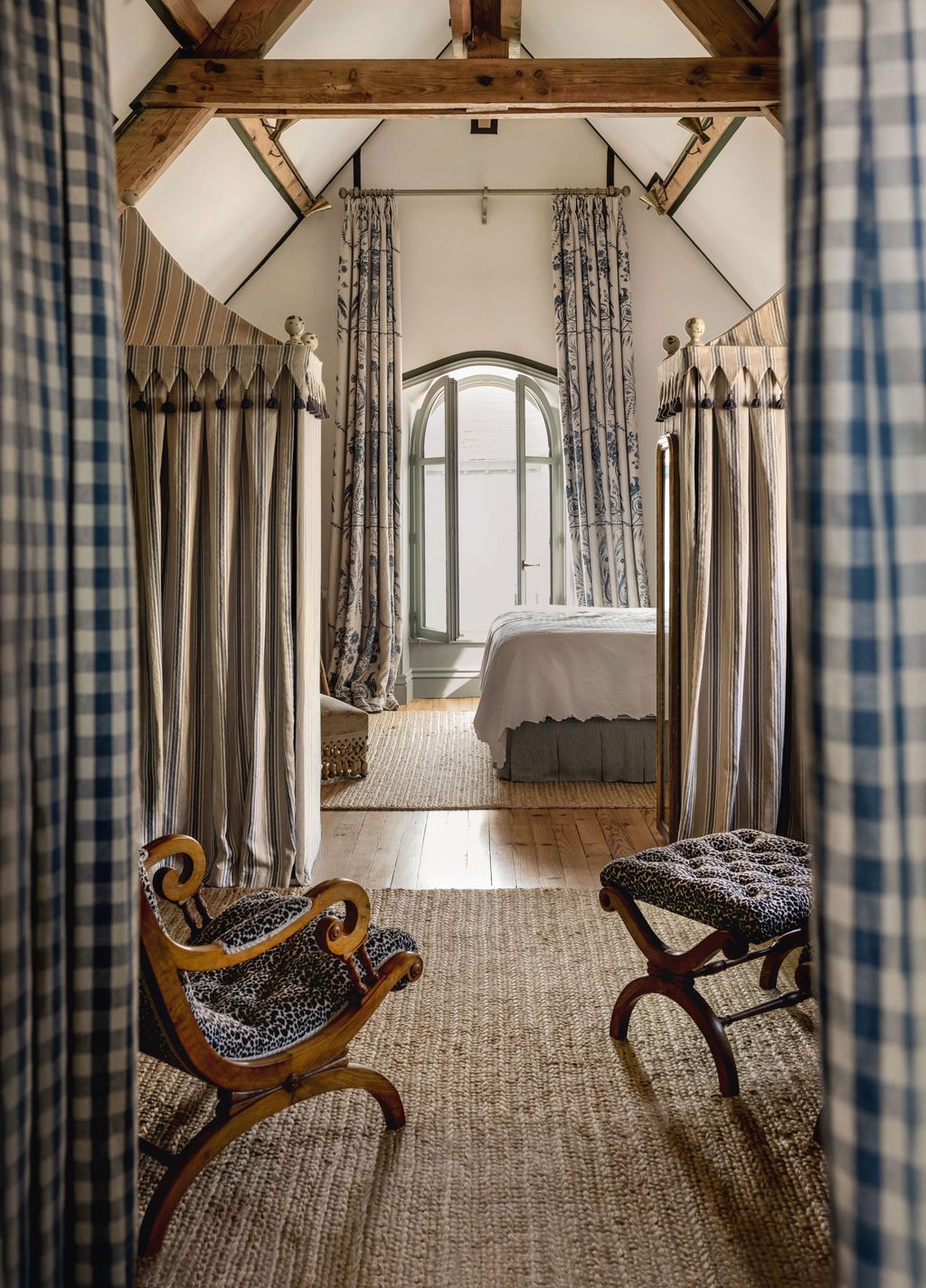 Image may contain Furniture Indoors Chair Bed Bedroom Room Home Decor Rug Floor and Person