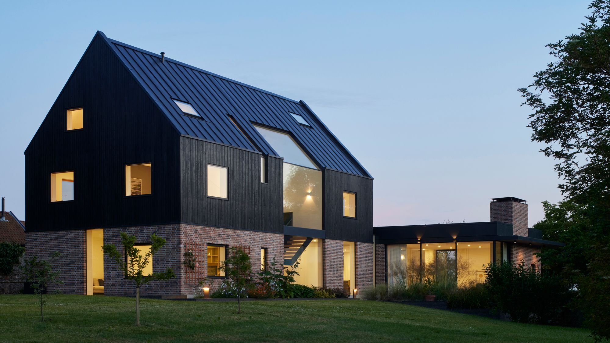 Image may contain: Grass, Plant, Lawn, Architecture, Building, House, Housing, Villa, Cottage, and Outdoors