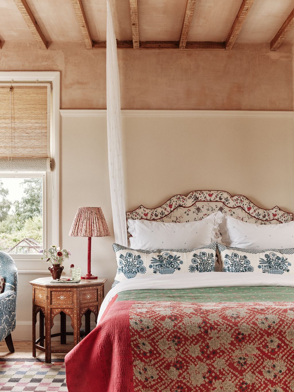 Image may contain Lamp Furniture Bed Bedroom Indoors Room Interior Design Desk Table and Chair