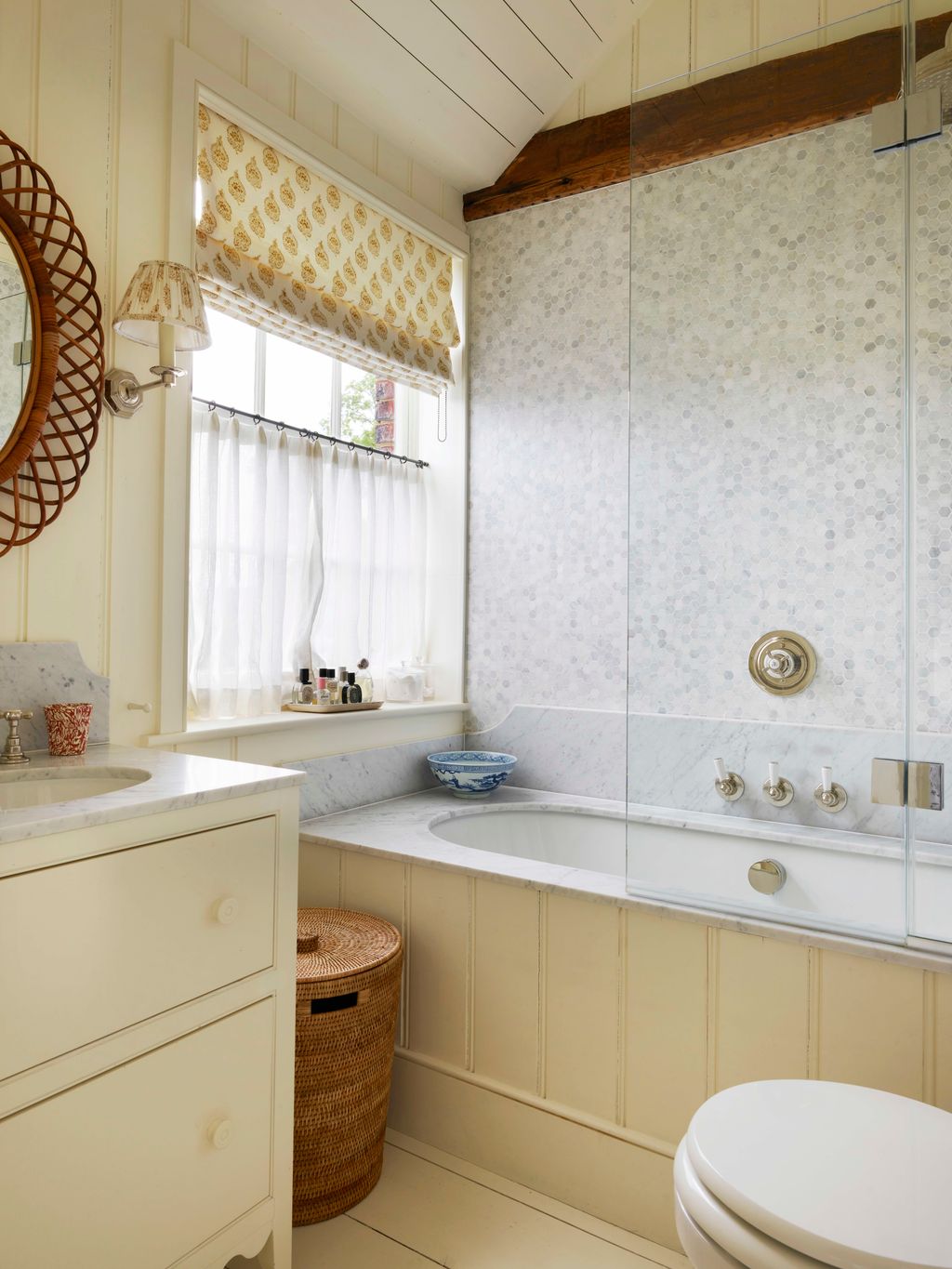 Image may contain Indoors Interior Design Lamp Sink Bathroom Room Toilet and Sink Faucet