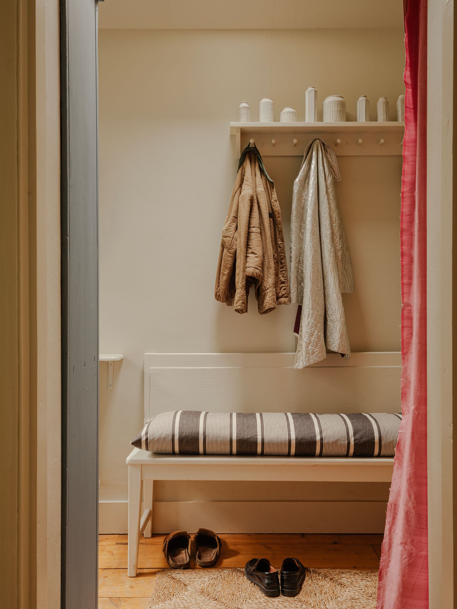 Image may contain Clothing Footwear Shoe Home Decor Rug Furniture Indoors Dressing Room Room and Interior Design