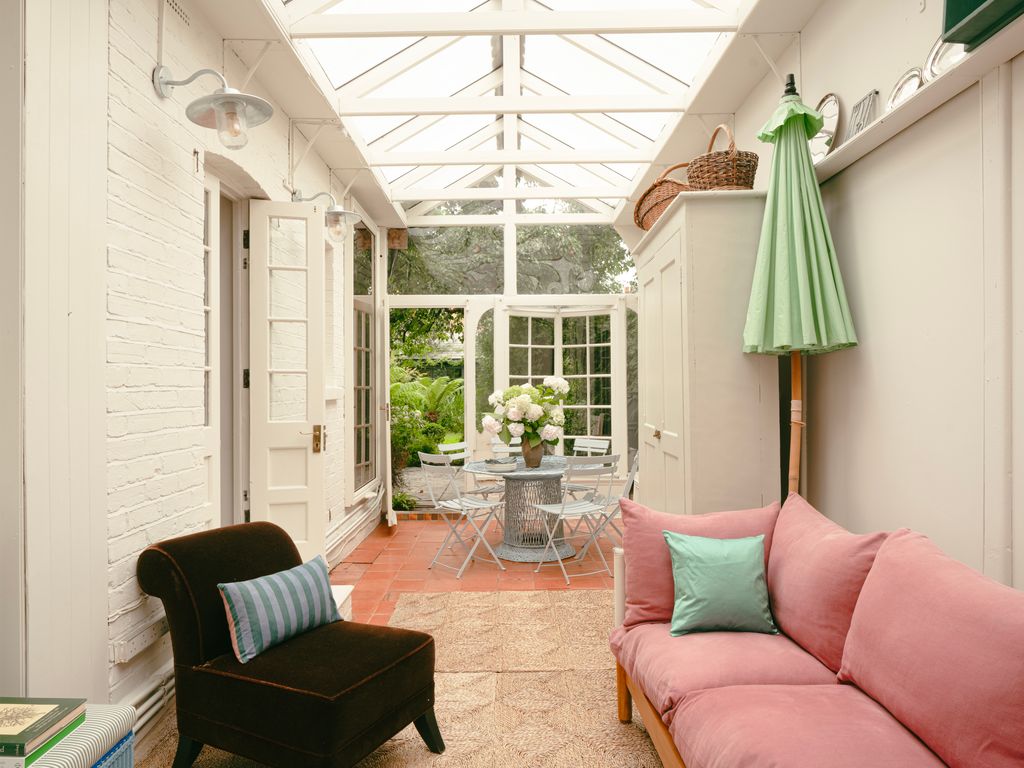 Image may contain Indoors Interior Design Architecture Building Furniture Living Room Room Chair and Couch