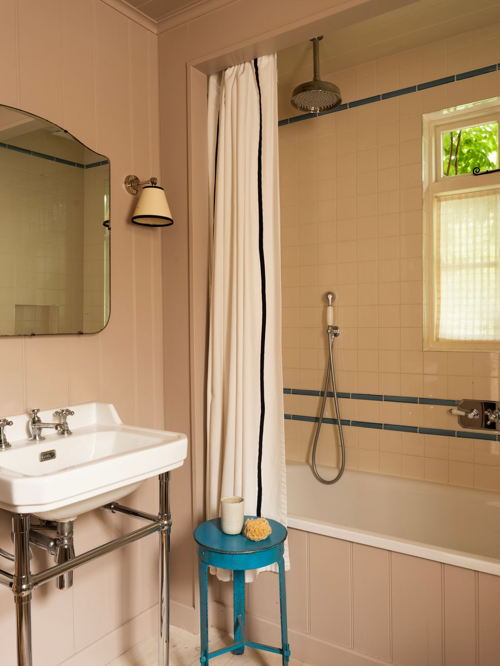 Image may contain Sink Sink Faucet Indoors Interior Design Bathroom Room Shower Faucet and Cup