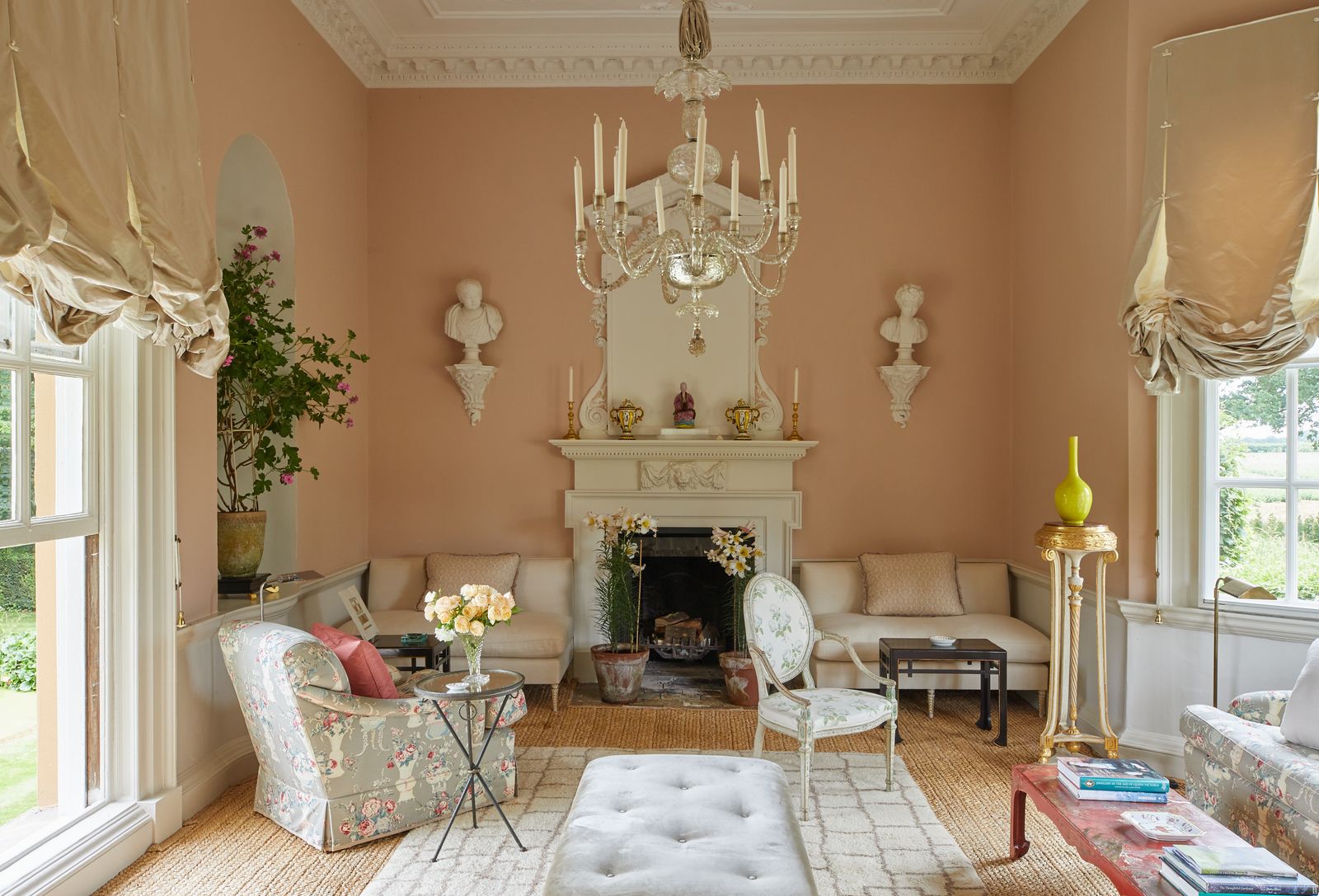 Image may contain Home Decor Chandelier Lamp Chair Furniture Architecture Building Indoors Living Room and Room