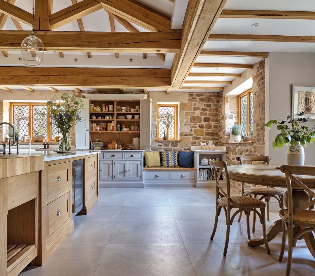 Image may contain Indoors Interior Design Floor Architecture Building Dining Room Dining Table Furniture and Room