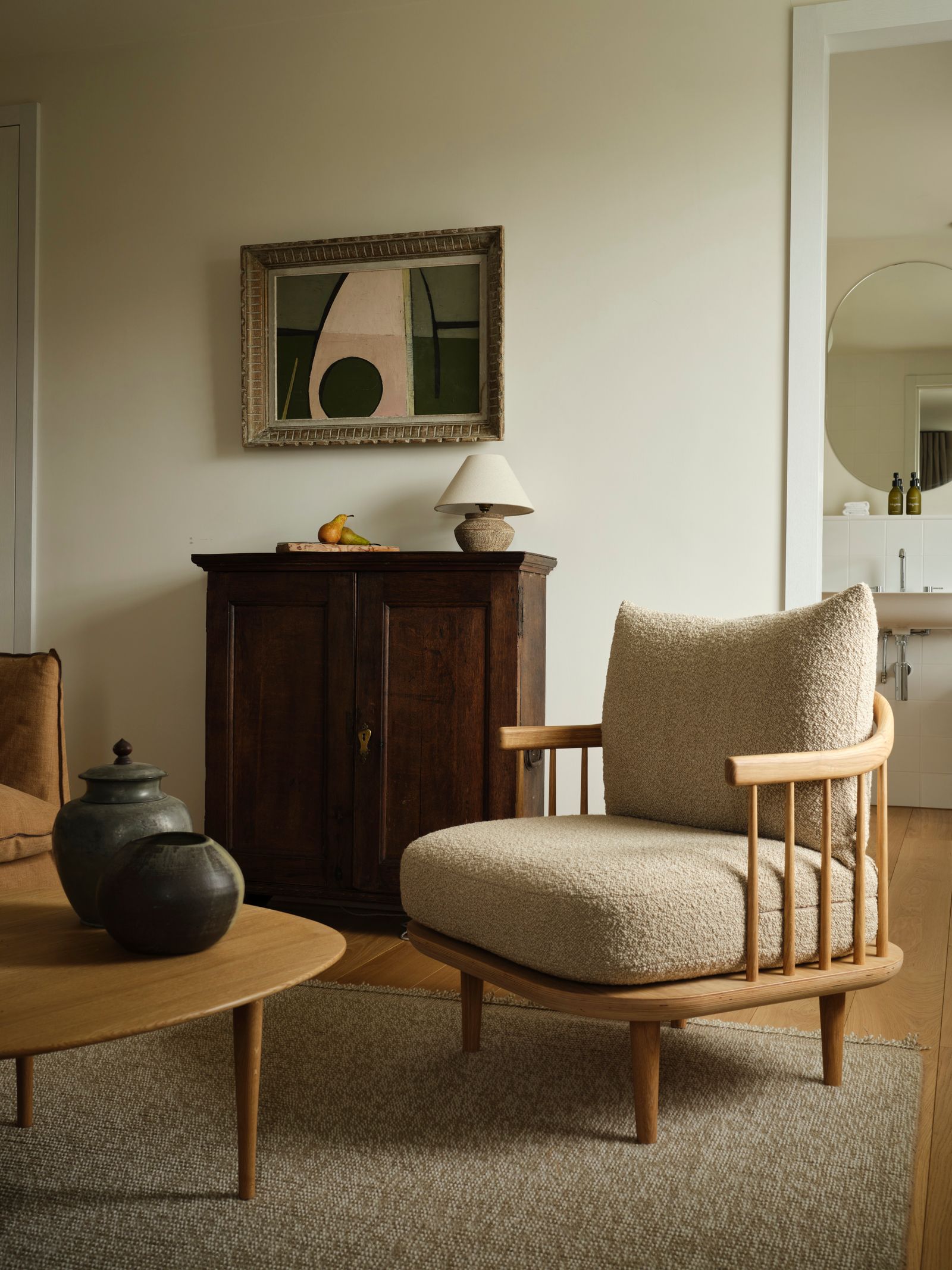 Image may contain Lamp Furniture Chair Home Decor Rug Banana Food Fruit Plant Produce Art and Painting