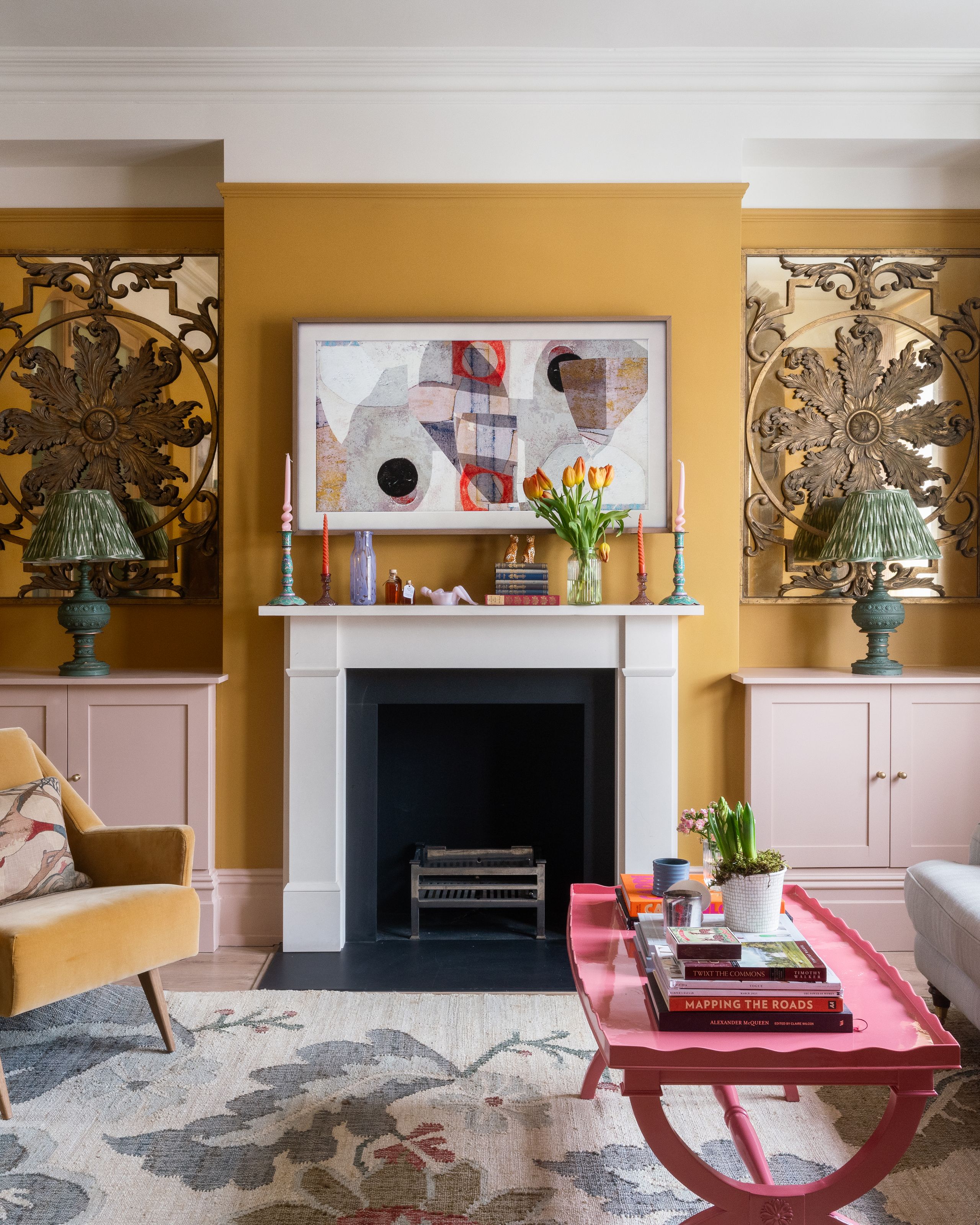 Image may contain: Indoors, Interior Design, Home Decor, Fireplace, Furniture, Table, Lamp, Coffee Table, and Architecture