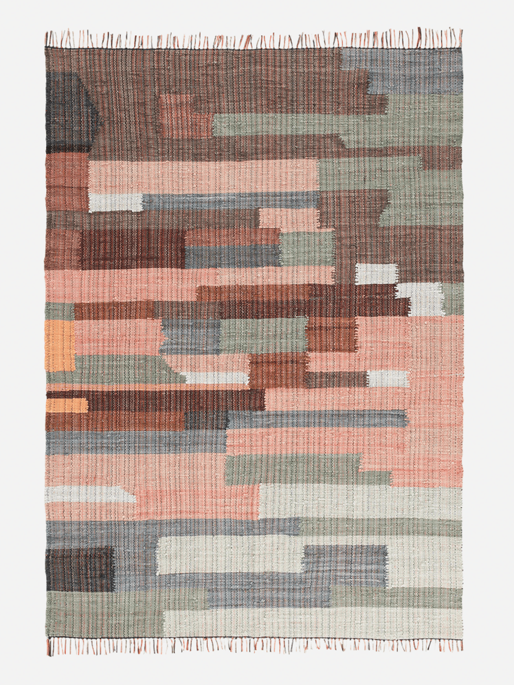 Image may contain: Home Decor, Rug, Clothing, Jeans, and Pants