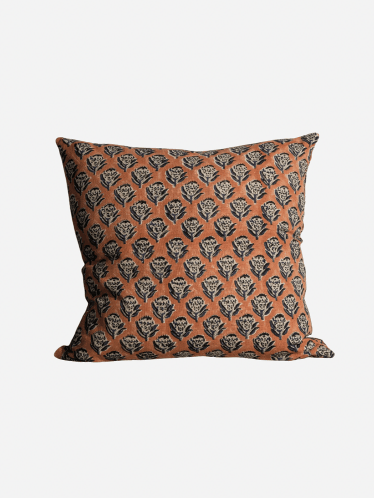 Image may contain: Cushion, Home Decor, Pillow, Clothing, and Skirt