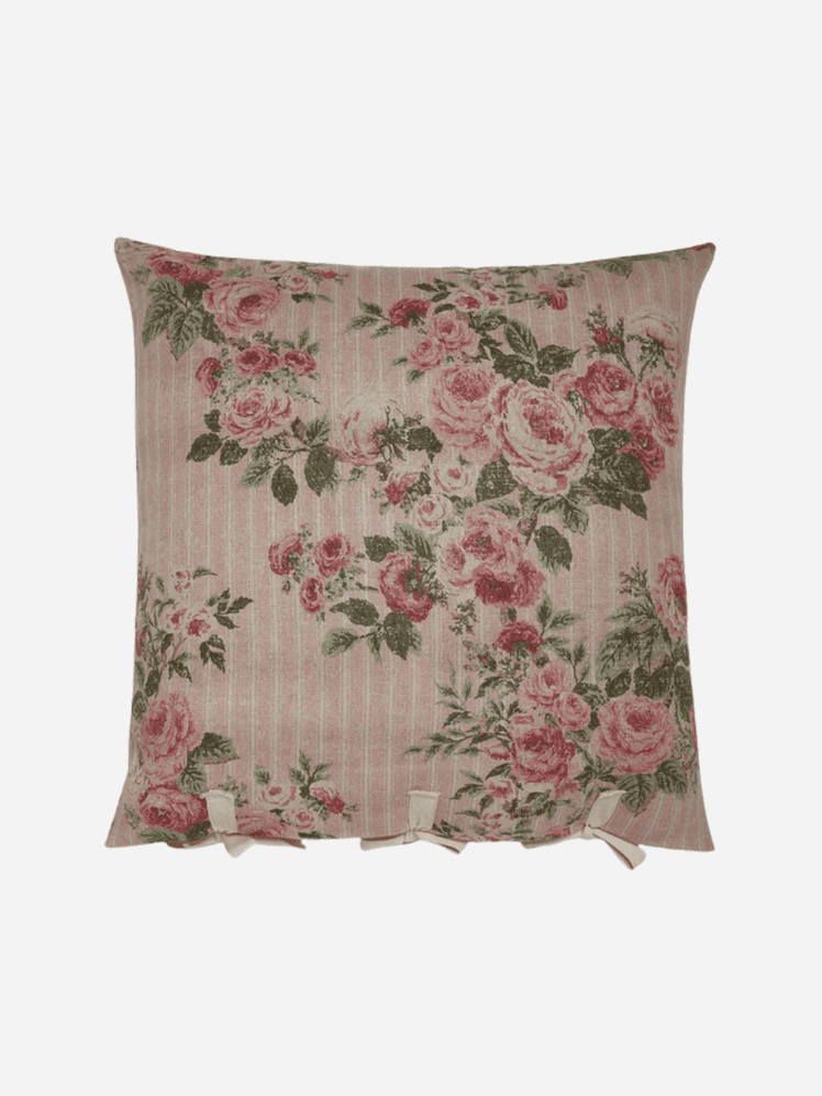 Image may contain: Cushion, Home Decor, Pillow, Flower, Plant, and Rose
