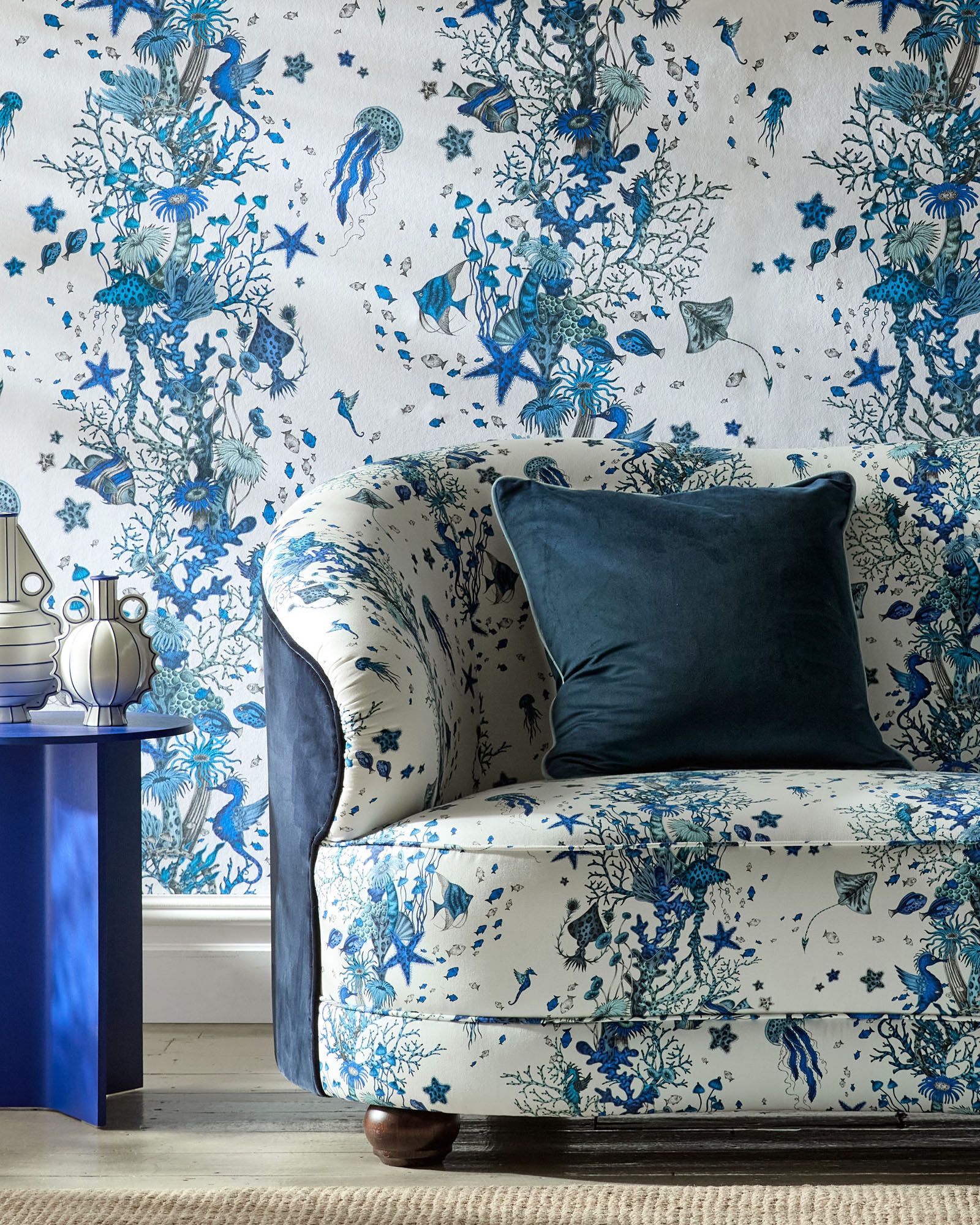 Image may contain: Indoors, Interior Design, Cushion, Home Decor, Furniture, Couch, and Pillow