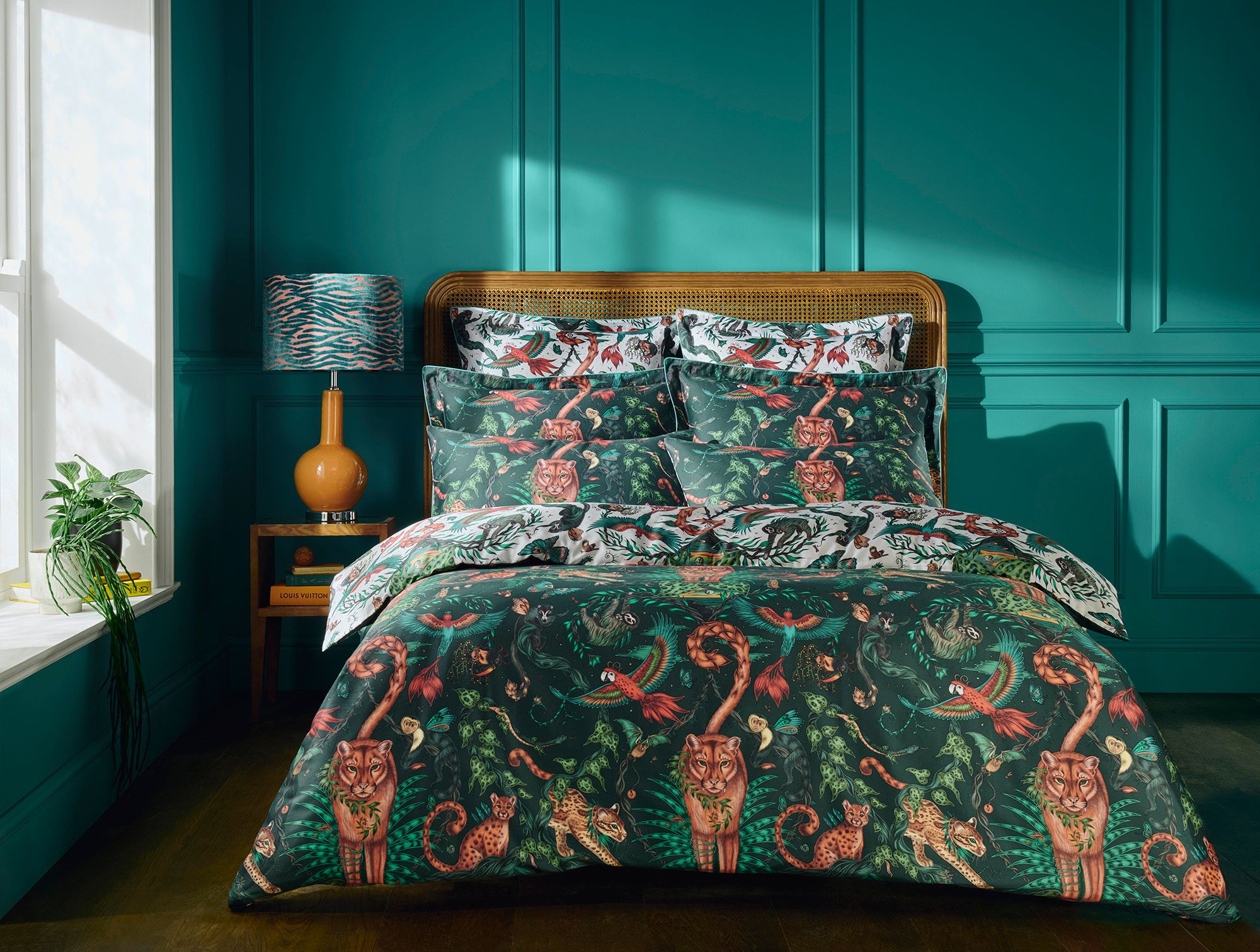 Image may contain: Furniture, Lamp, Bed, and Bed Sheet