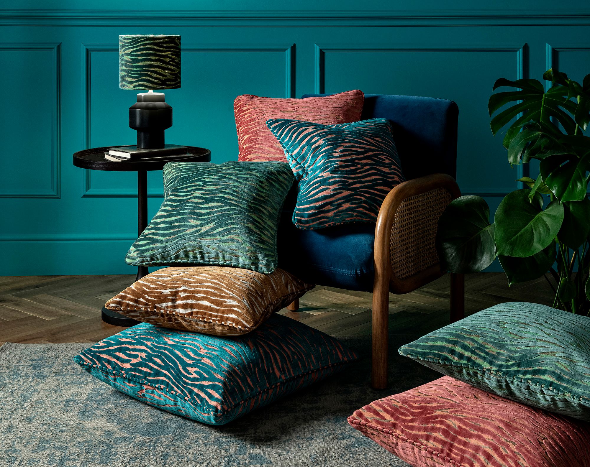 Image may contain: Cushion, Home Decor, Furniture, Lamp, Pillow, Chair, and Armchair