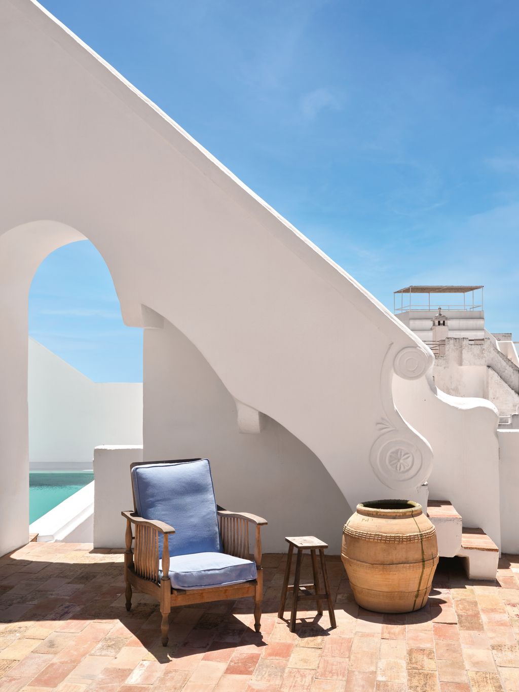 Image may contain Architecture Building House Housing Staircase Chair and Furniture