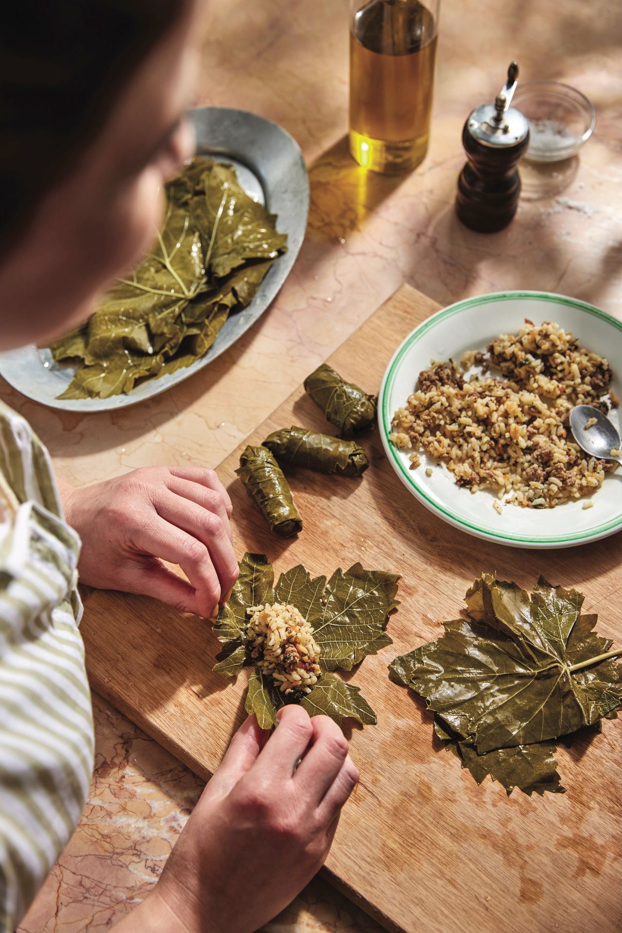 Image may contain Food Food Presentation Plate Person Cutlery Spoon and Cup