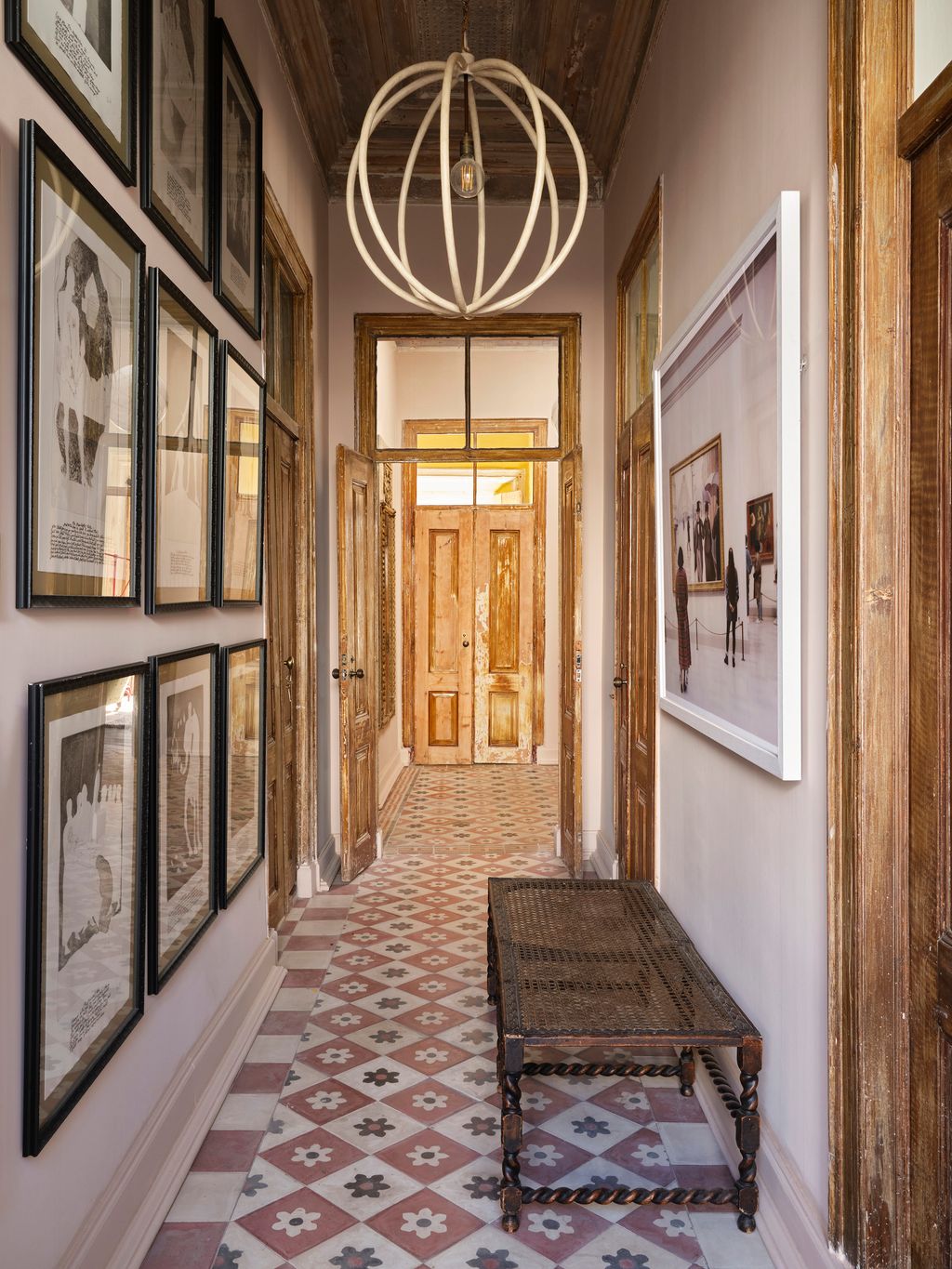 Image may contain Floor Indoors Interior Design Art Painting Flooring Architecture Building Foyer and Chandelier