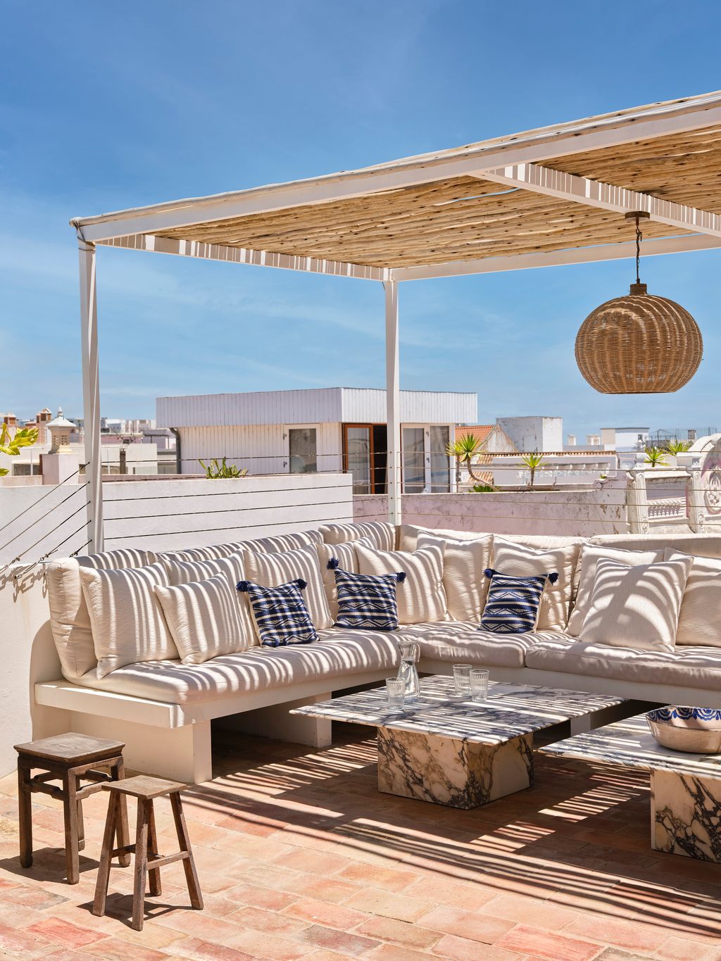 Image may contain Furniture Indoors Interior Design Cup Lamp Architecture Building Lounge Couch Bed and Bedroom