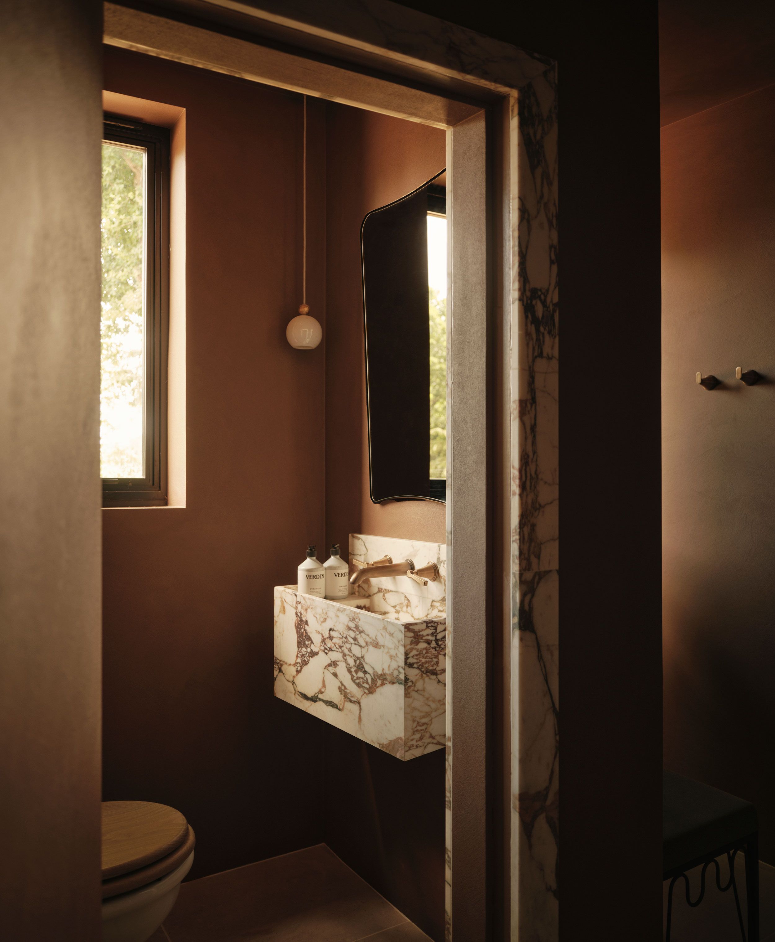 Image may contain: Corner, Indoors, Interior Design, Bathroom, Room, and Toilet