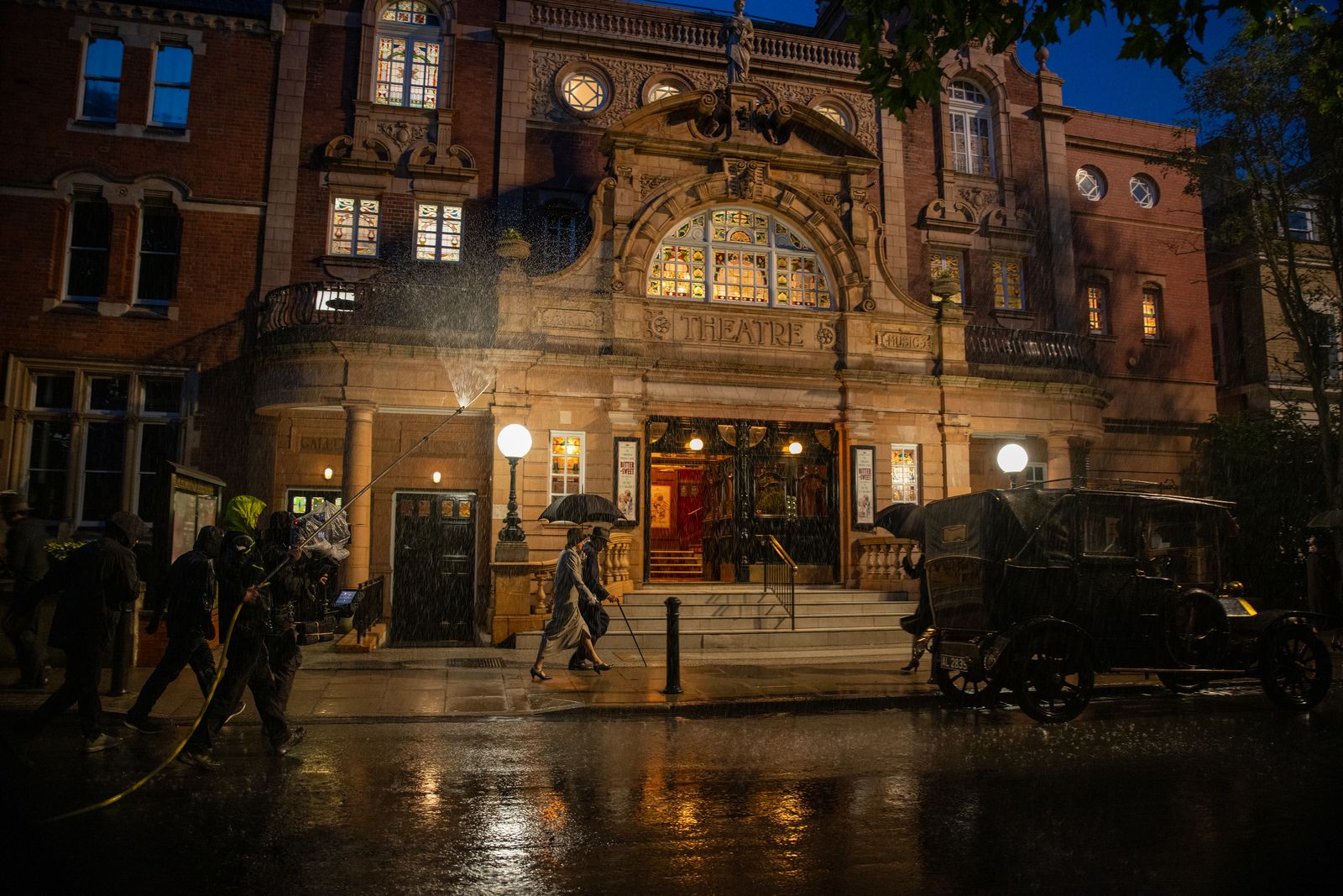 Image may contain City Road Street Urban Person Adult Clothing Footwear Shoe Car Transportation and Vehicle