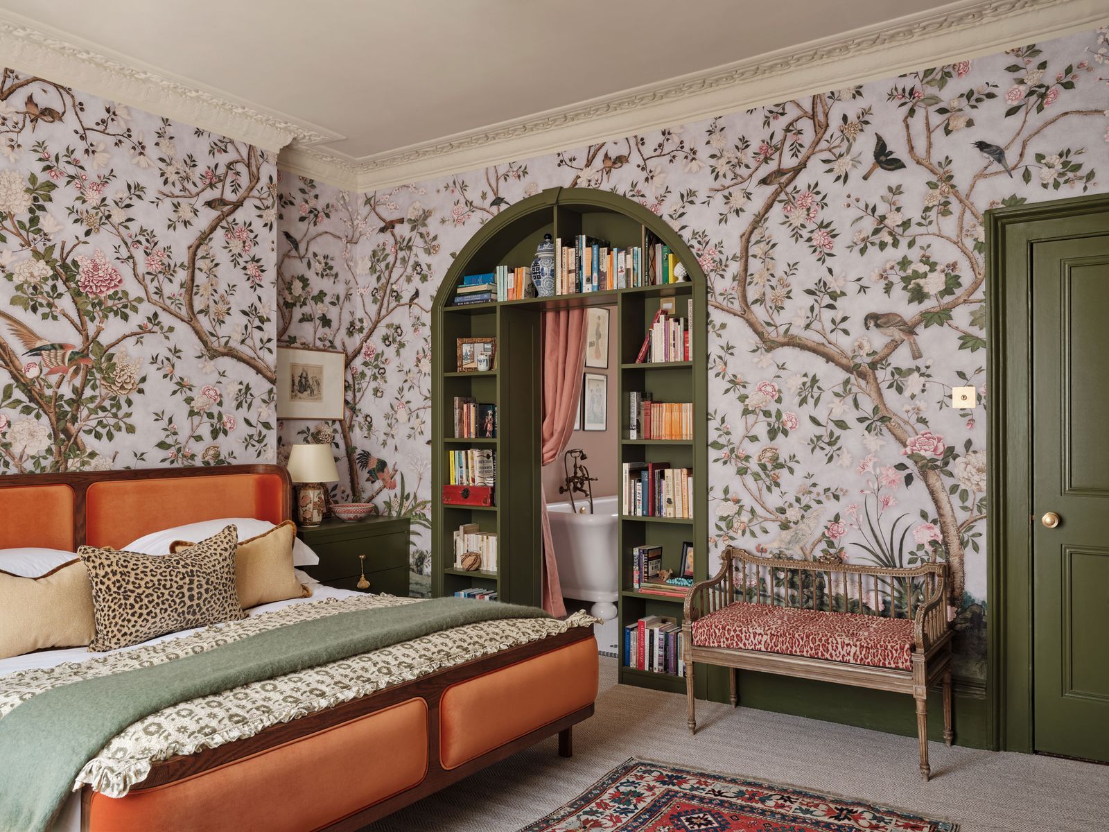 Image may contain Home Decor Lamp Bed Furniture Rug Bench Cushion Art Painting Bathing Bathtub Person and Tub